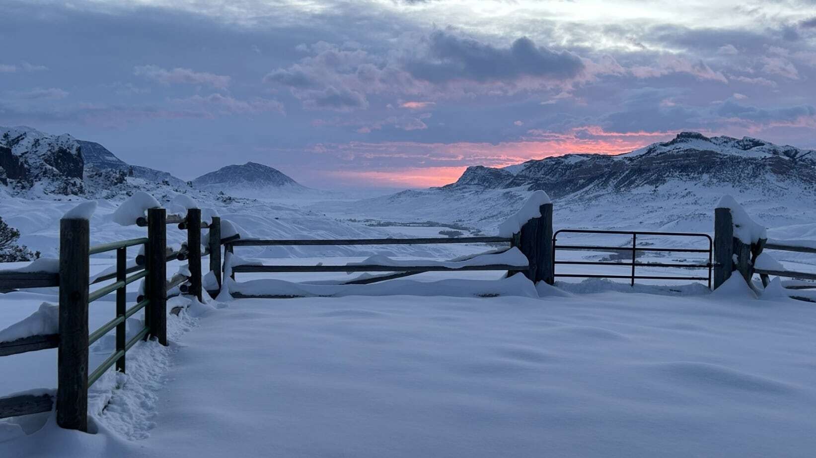 "A mesmerizing early morning Sunrise over Buffalo Bill Reservoir and Sheep Mountain. Taken from Jim Mountain in Wapiti Valley."