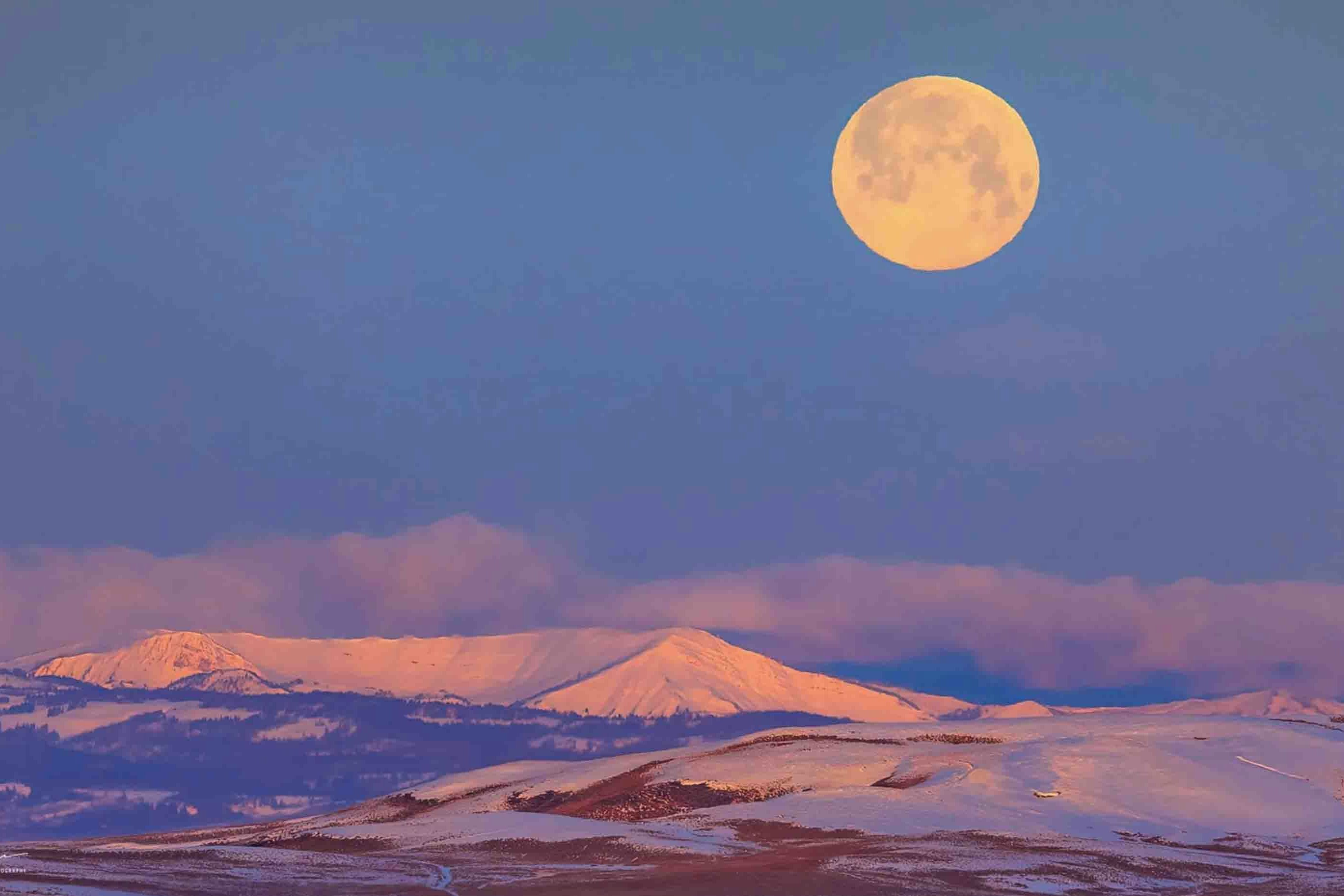 "Setting Snow Moon. The moon as it was setting over the Hoback Range this morning was gorgeous."