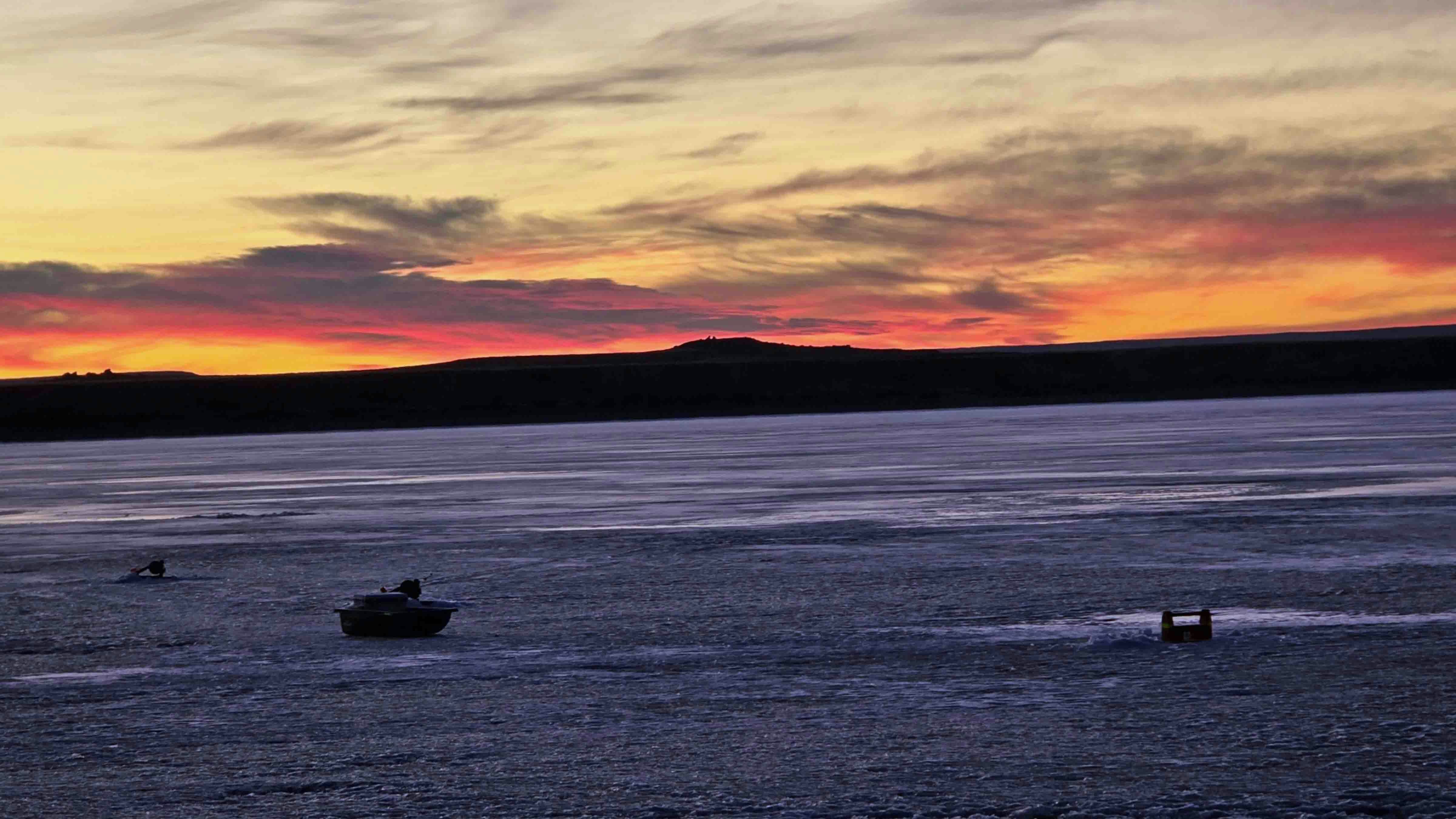 "Hoping the flags of my tip ups ice fishing Boysen come up as nicely as the sun!" Boysen Reservoir, outside Shoshoni, WY