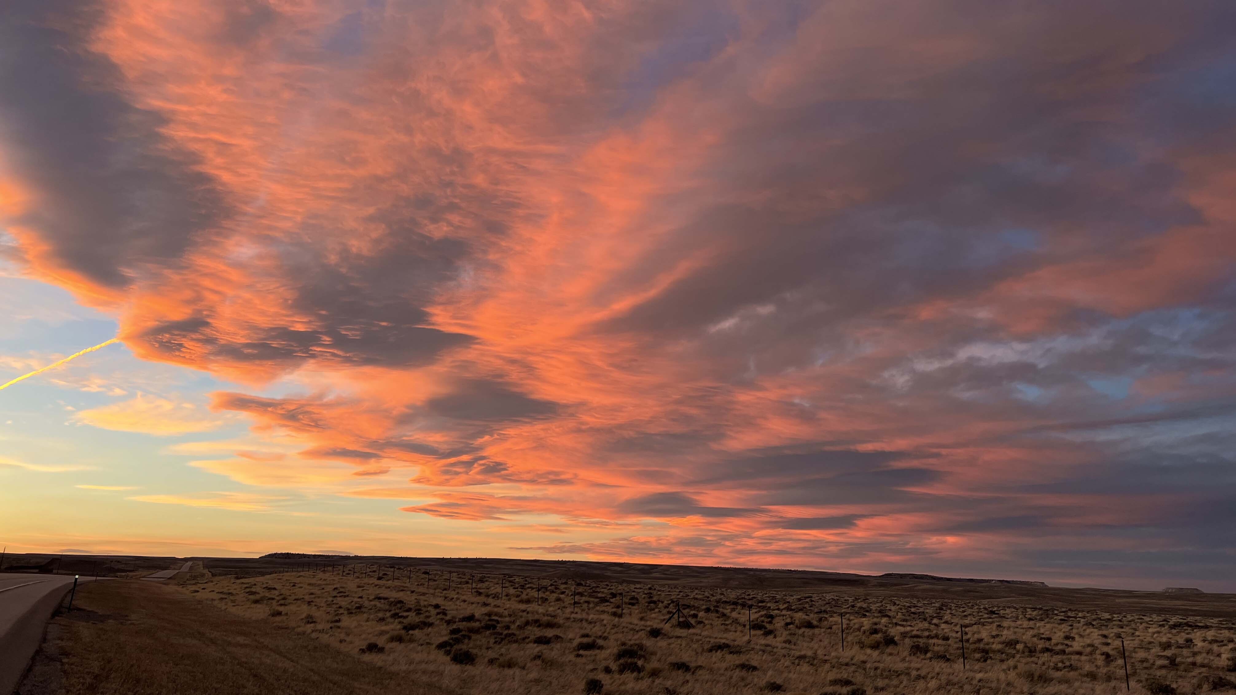"A spectacular sunset as we drove towards Lander over Beaver Rim."