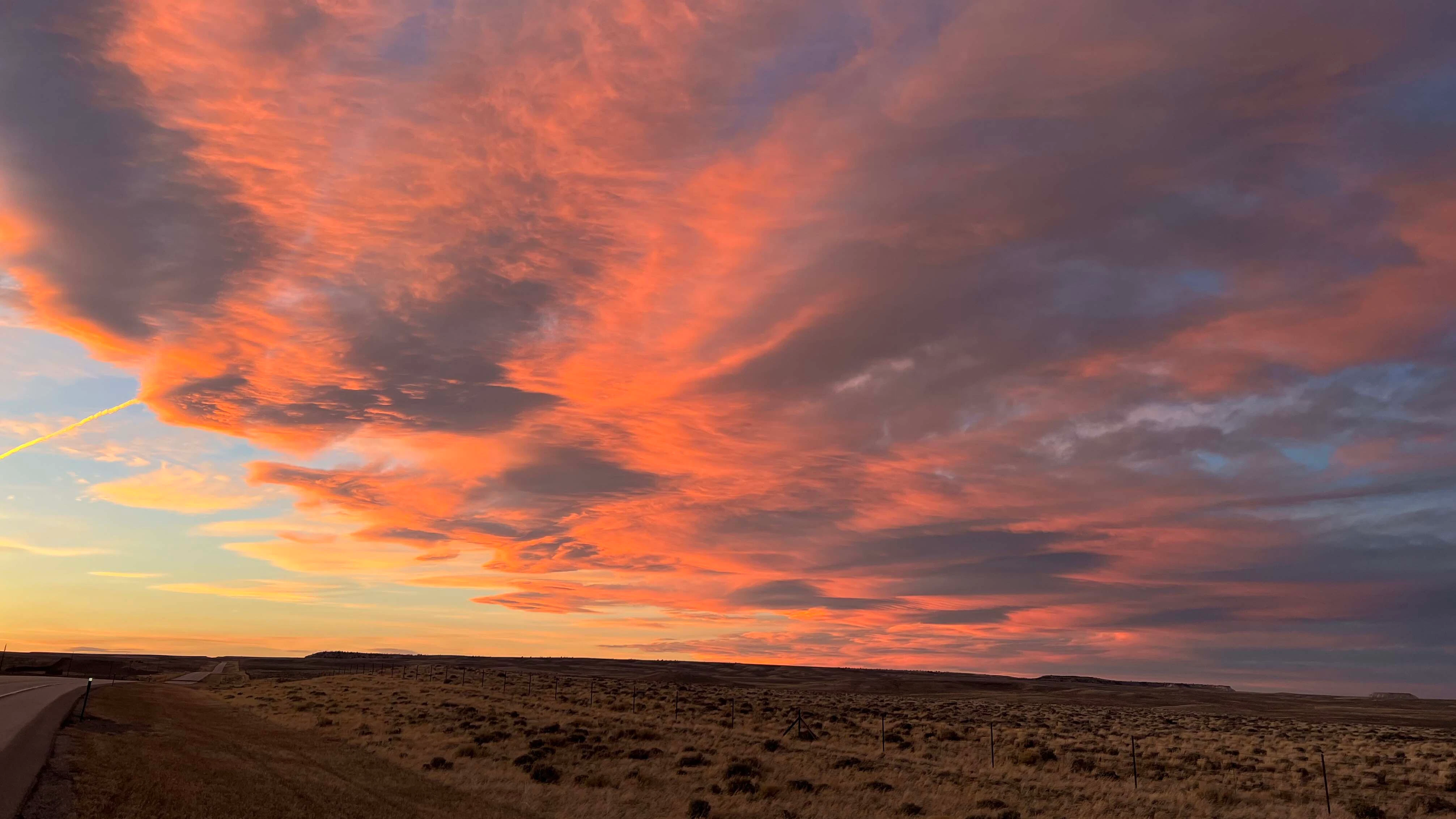 "A spectacular sunset as we drove towards Lander over Beaver Rim."