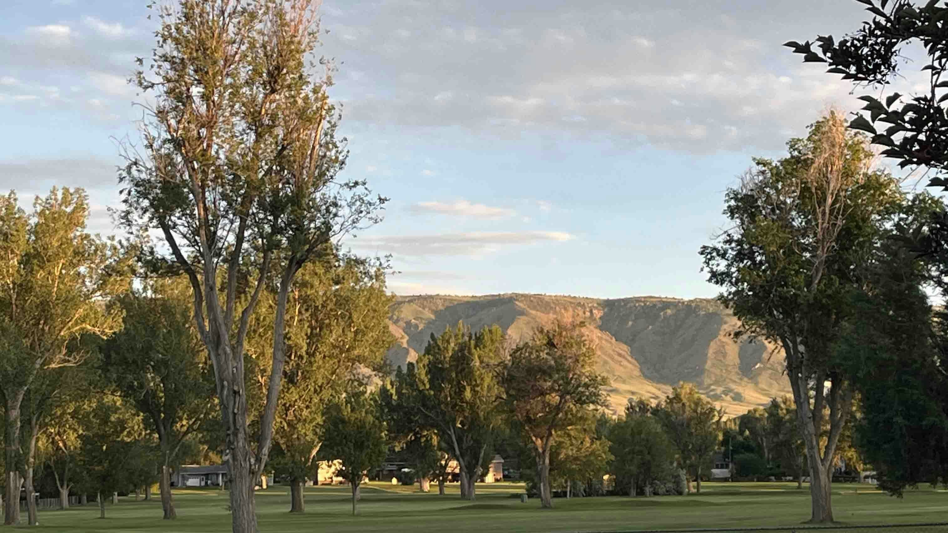 "On the golf course looking toward the dastardly contemplation of Casper's proposed new gravel pit at the base of our beautiful mountain on June 11, 2024."."
