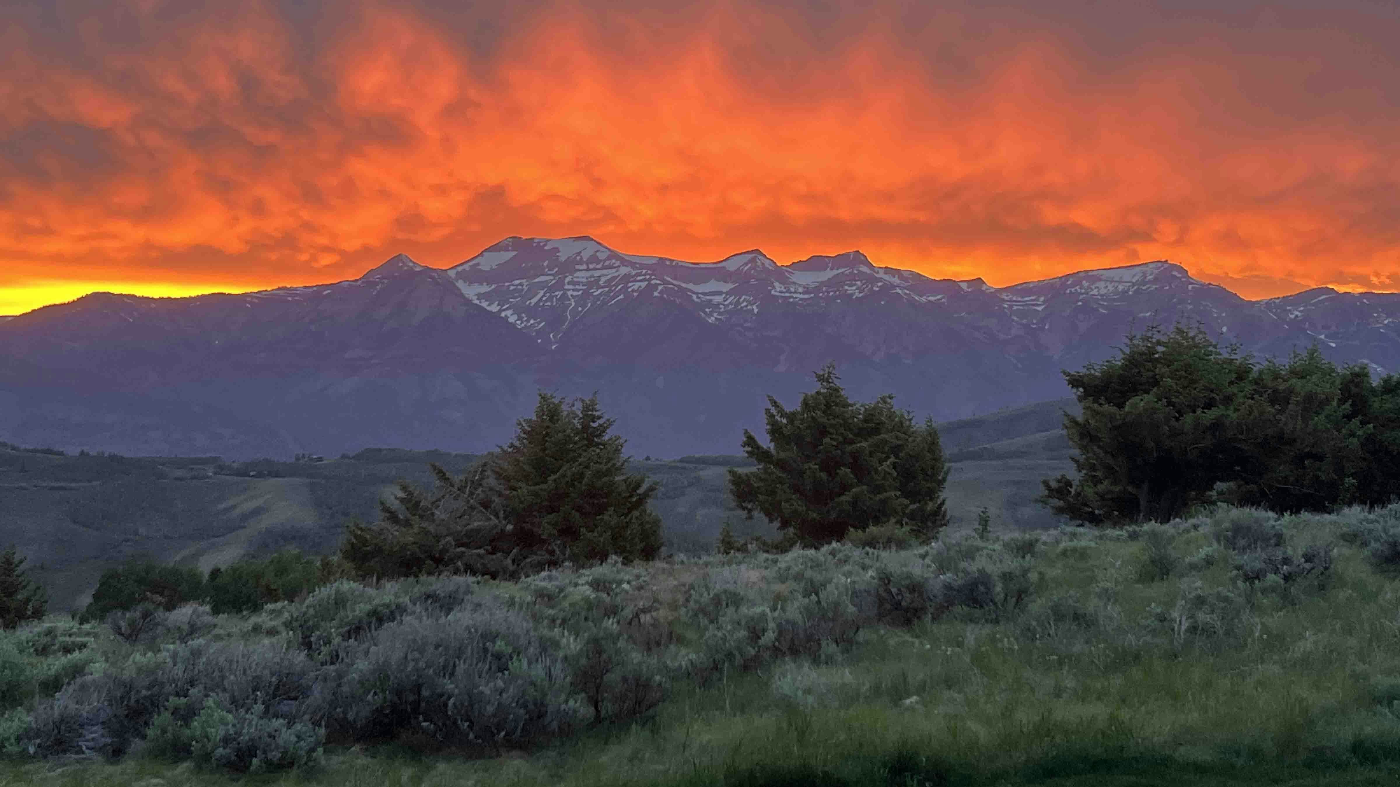 "This sunset closed the day on Father’s Day at Spring Creek Ranch looking west towards our beloved Teton Range."