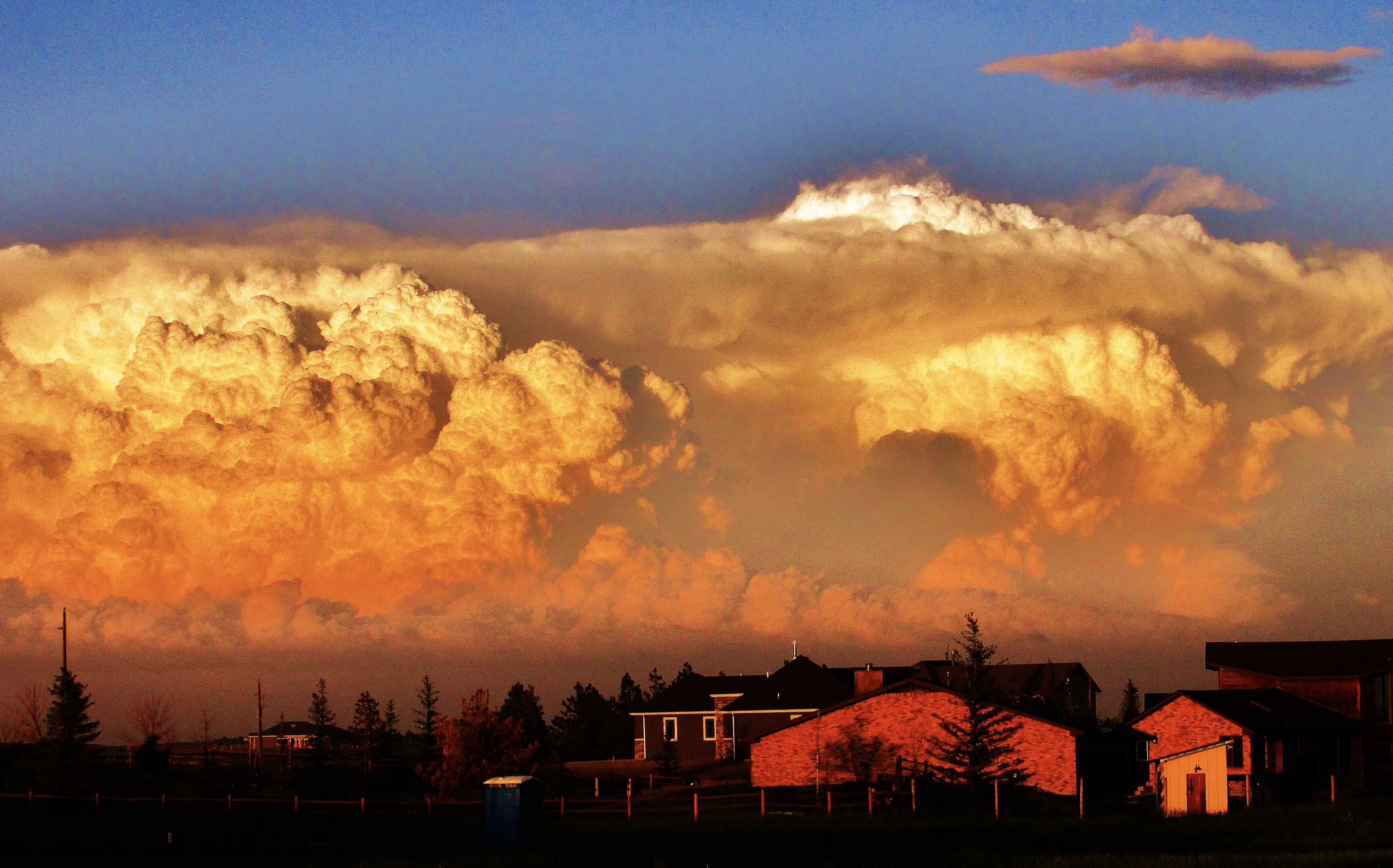 Supercell thunderheads at sunset. Taken near Horse Creek Road in Cheyenne.