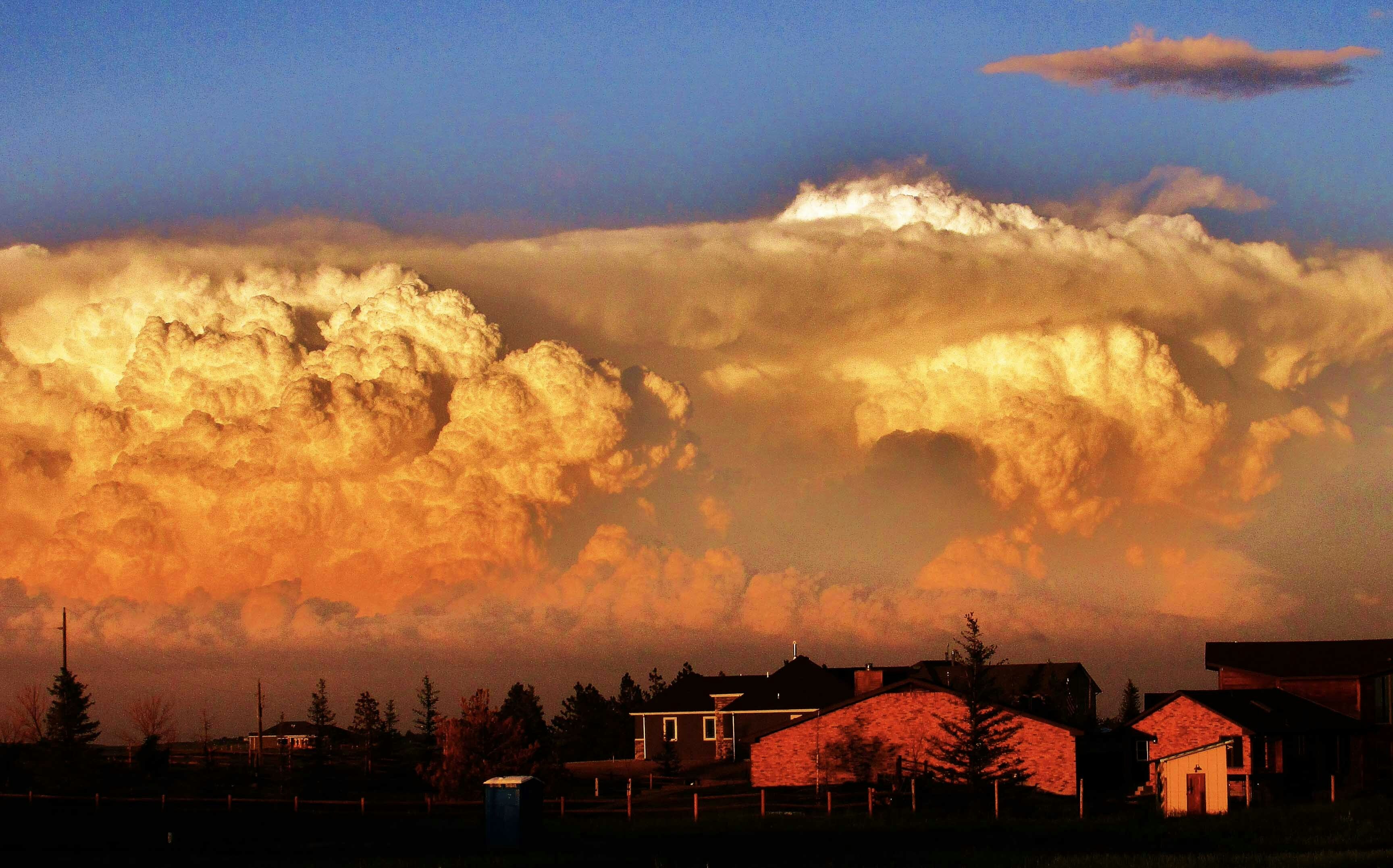 Supercell thunderheads at sunset. Taken near Horse Creek Road in Cheyenne.