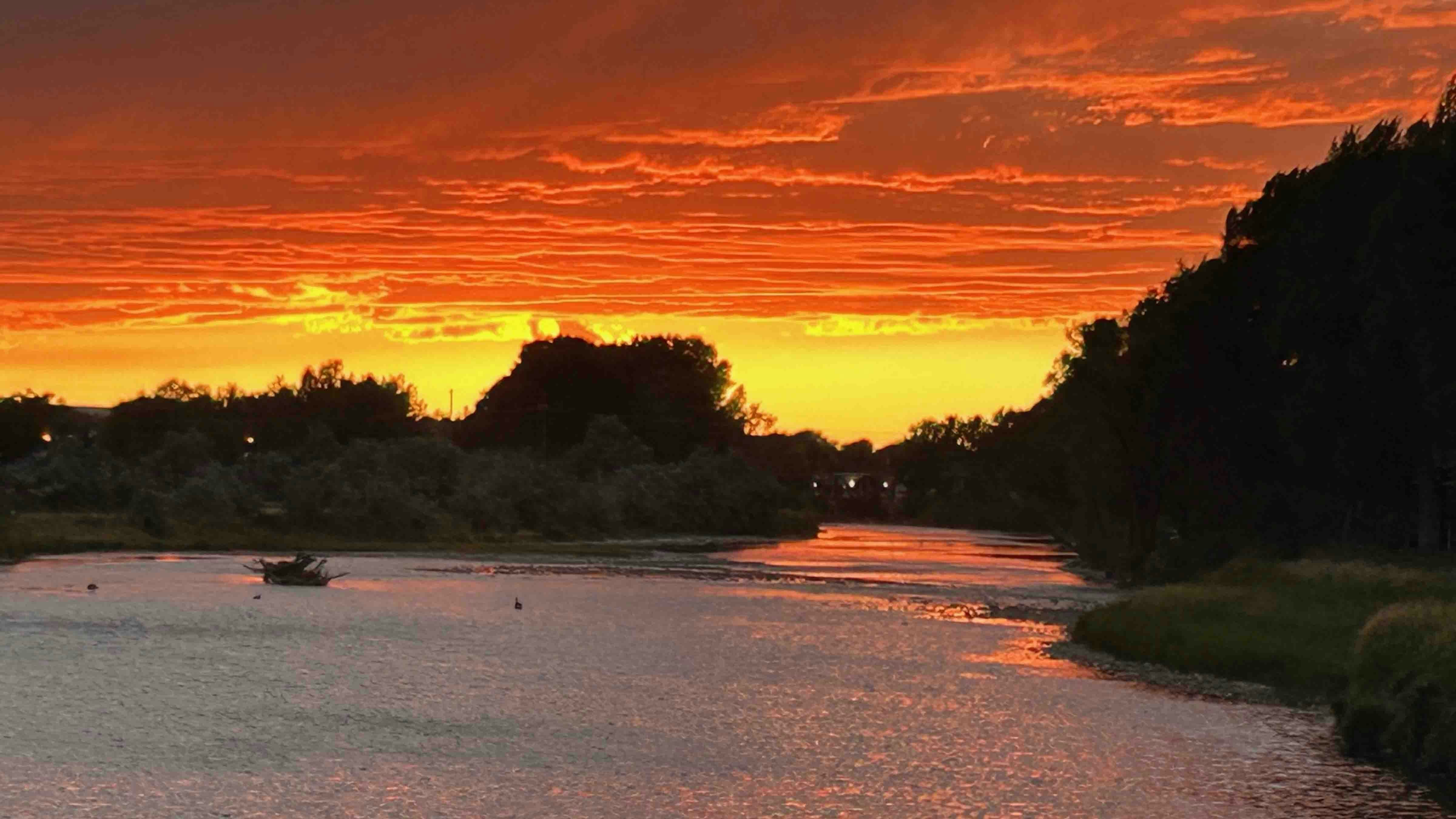 "Sunset from Pic Walker Bridge in Saratoga, Wyoming."