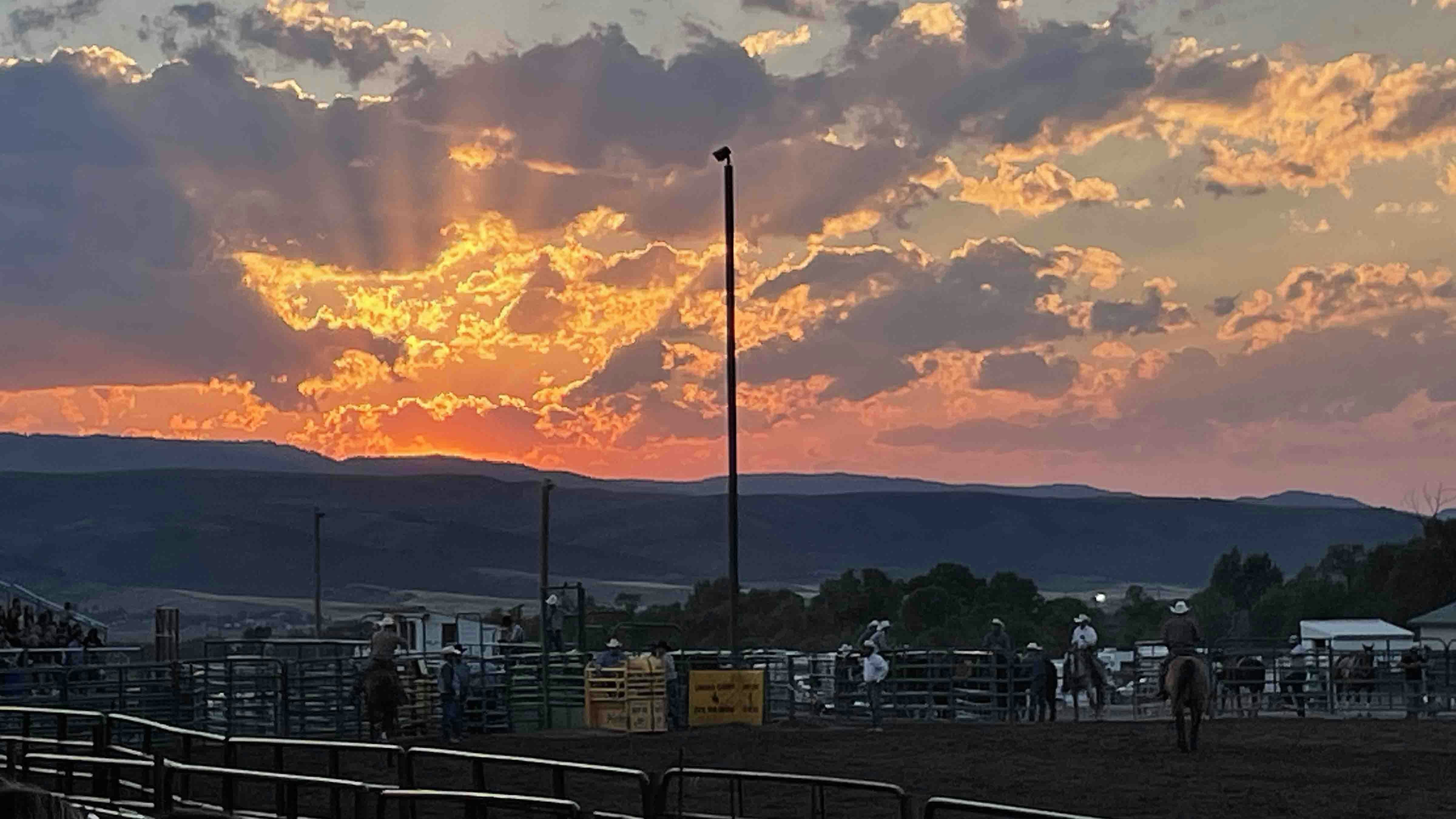 "Sunset at Lincoln County Fair rodeo in Afton."