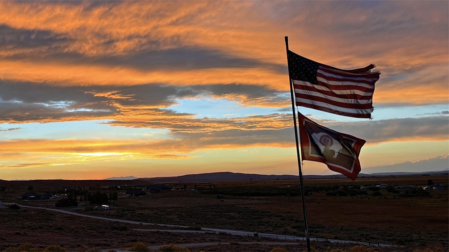 Wednesday sunset from Pinedale with Old Glory in the foreground and the Tetons just visible in the background.