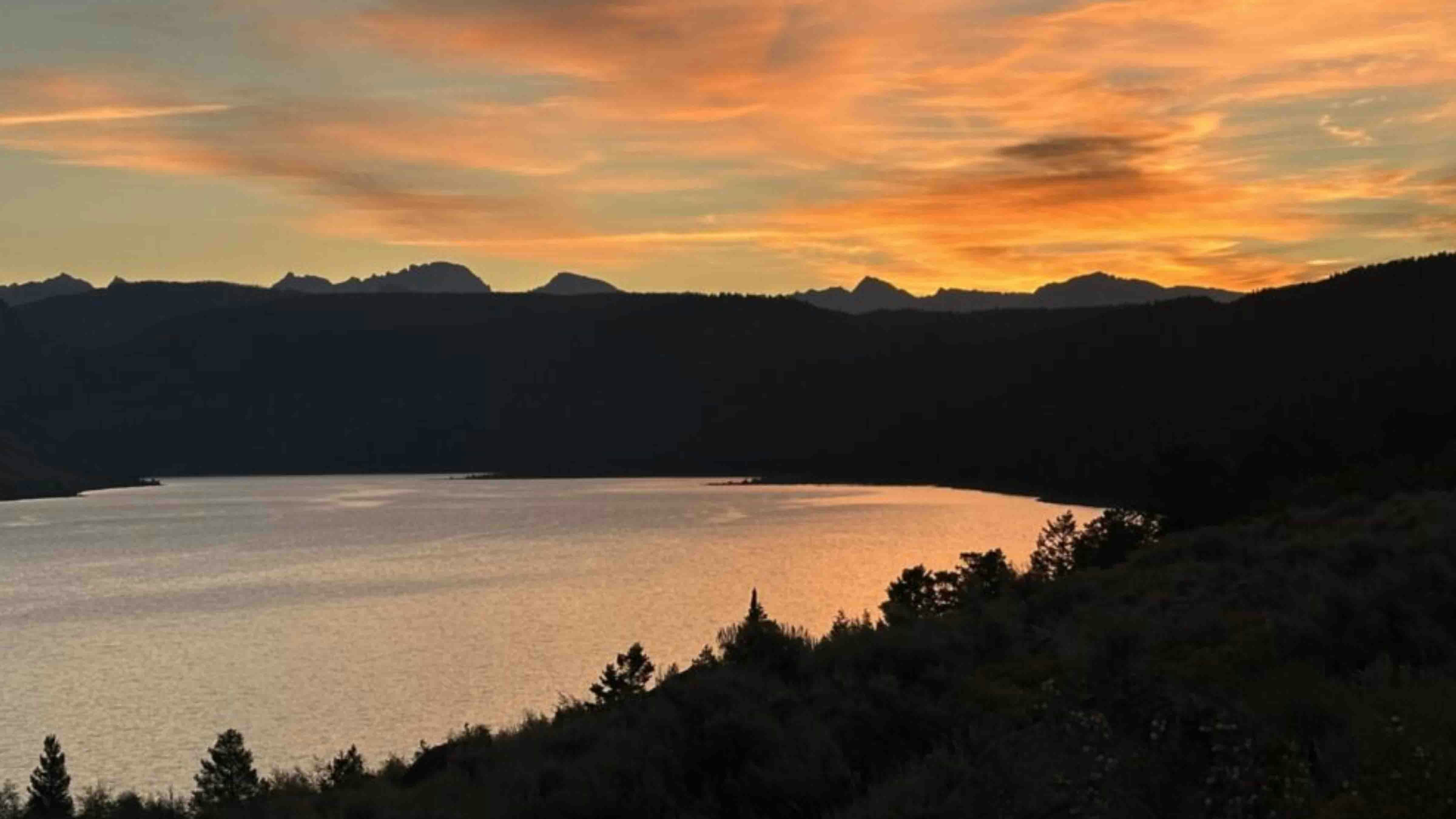"Late summer sunrise over Willow Lake and the Wind Rivers."