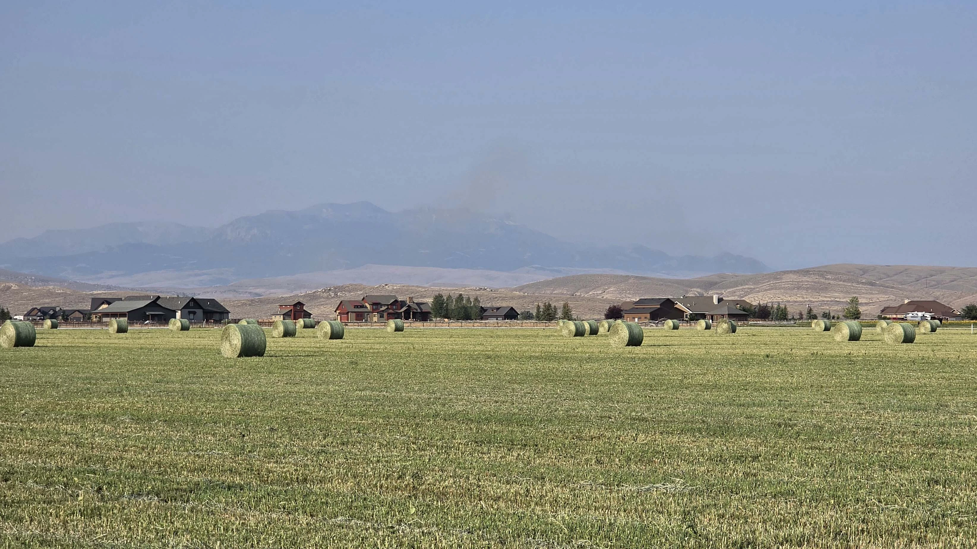 "Missed the sunrise, but got fresh hay bales and smoke from Washington  fires. The hay so beautiful and green."