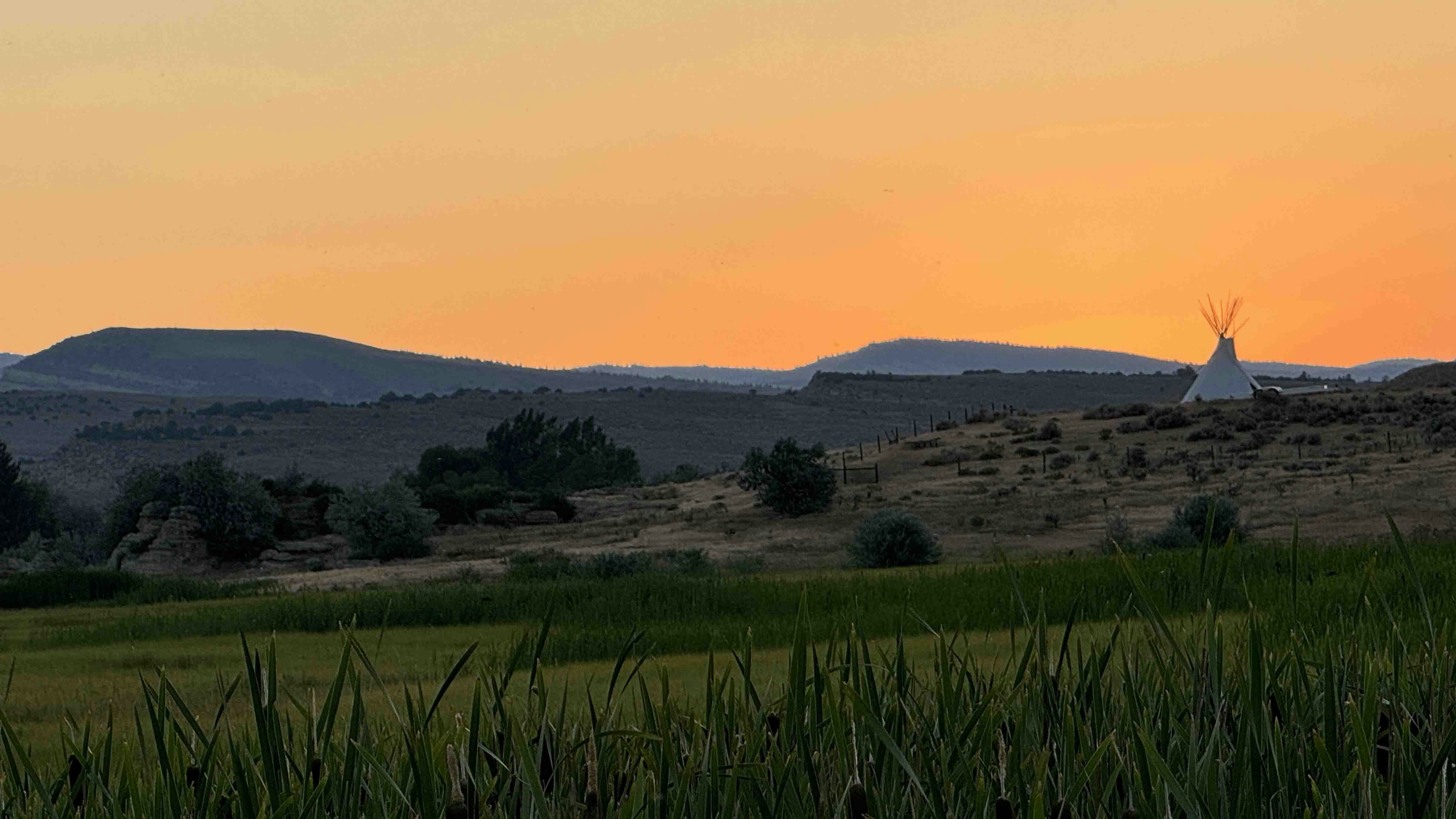 "I don’t like the smoky skies, but the sunset glow over the Wind River Mountains near Lander was pretty."