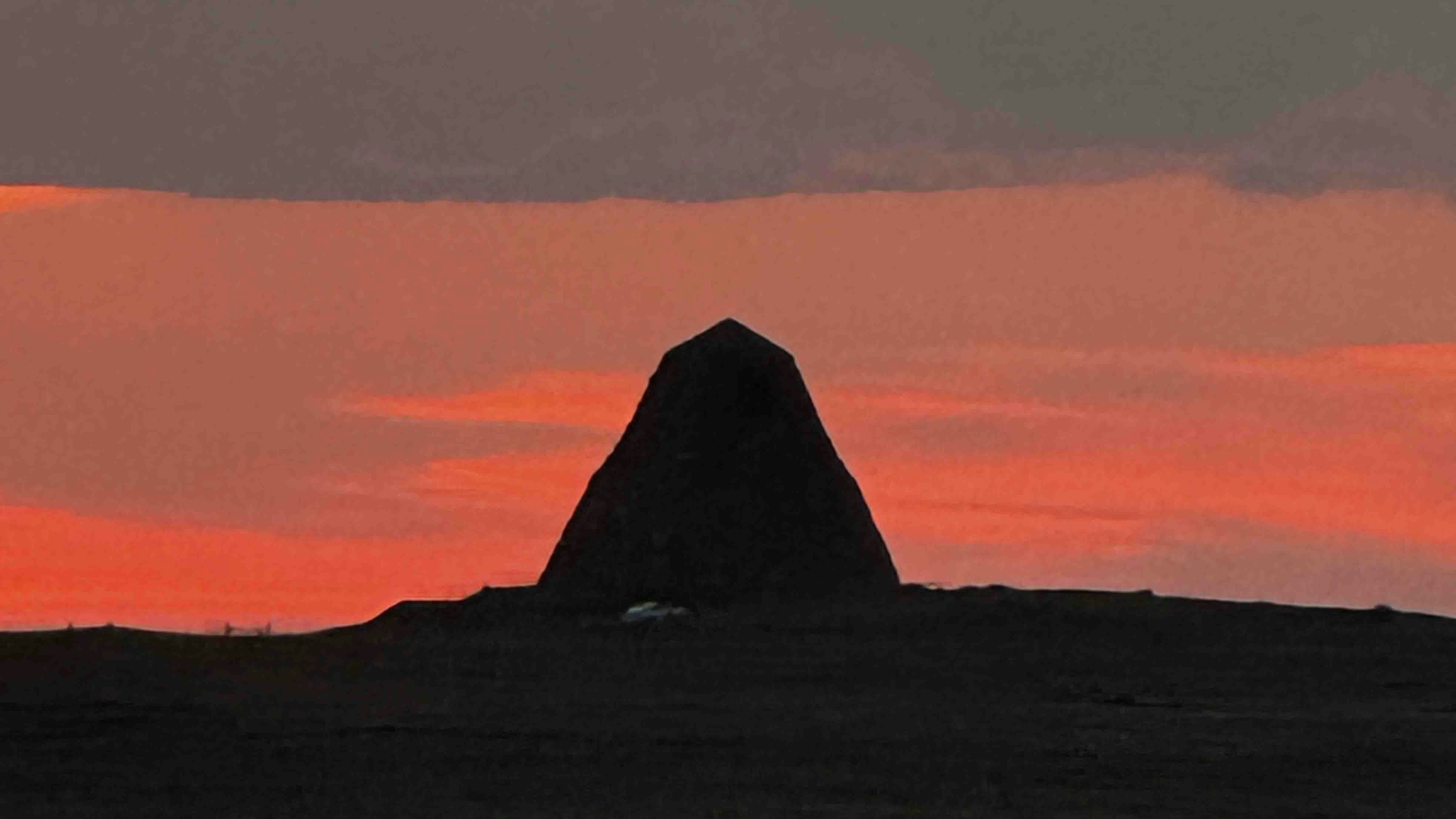 "Sunset pic over Ames Monument near Buford, Wyoming."