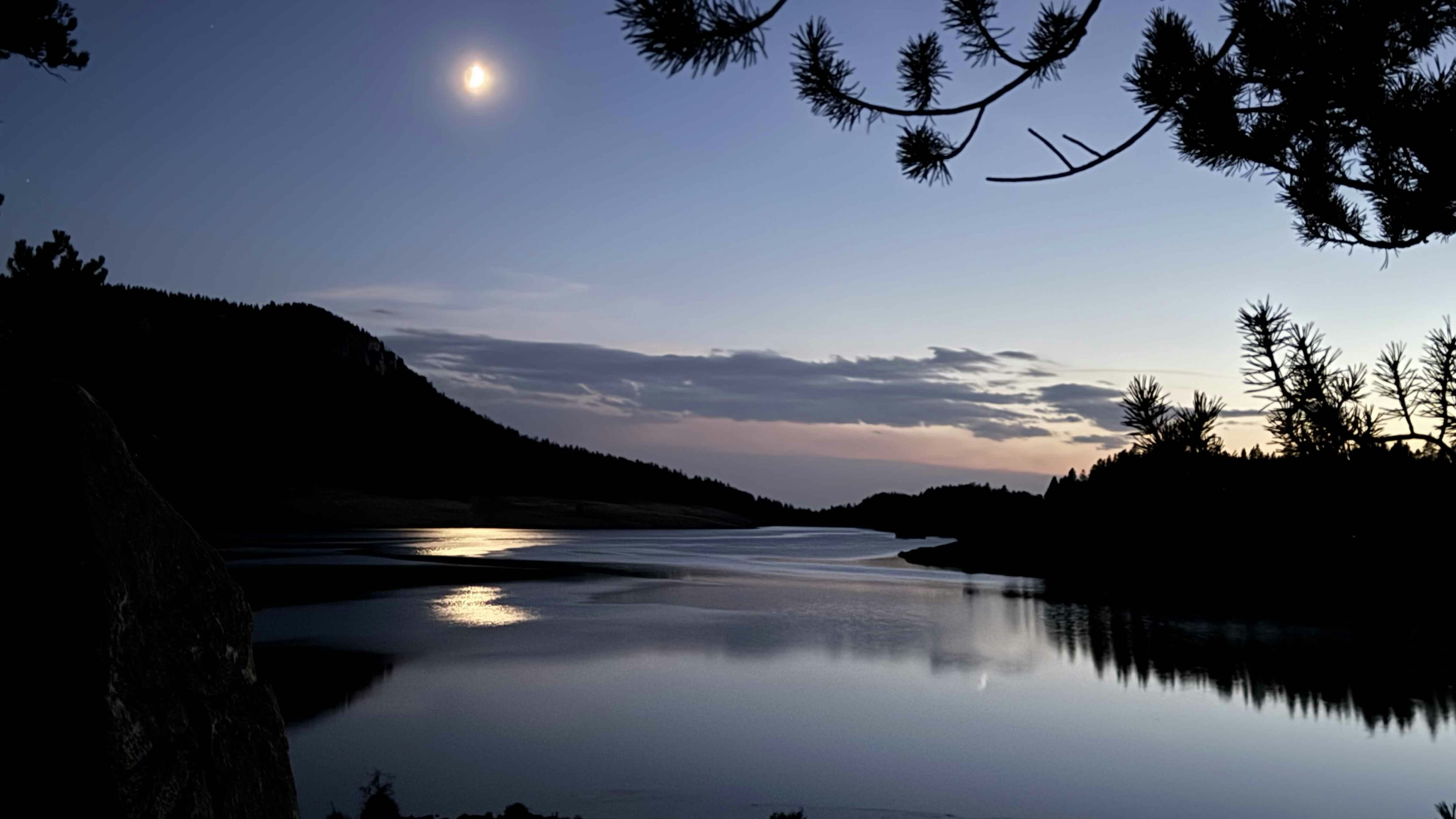 Moonrise with sunset over Meadowlark Lake in the Big Horns