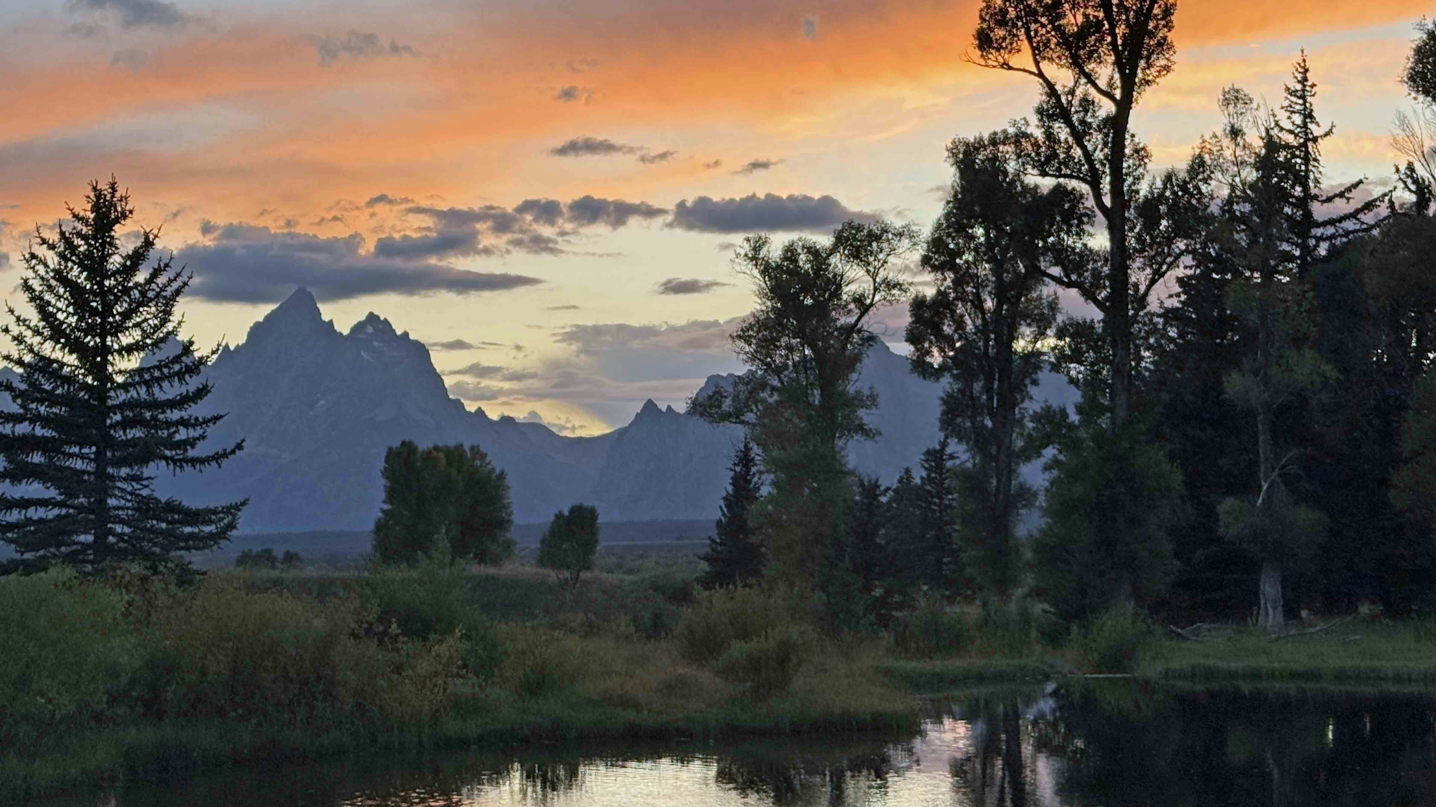 "What a wonderful sunset for the lovely couple that got married at the ranch today!" Moose Head Ranch, Wyoming