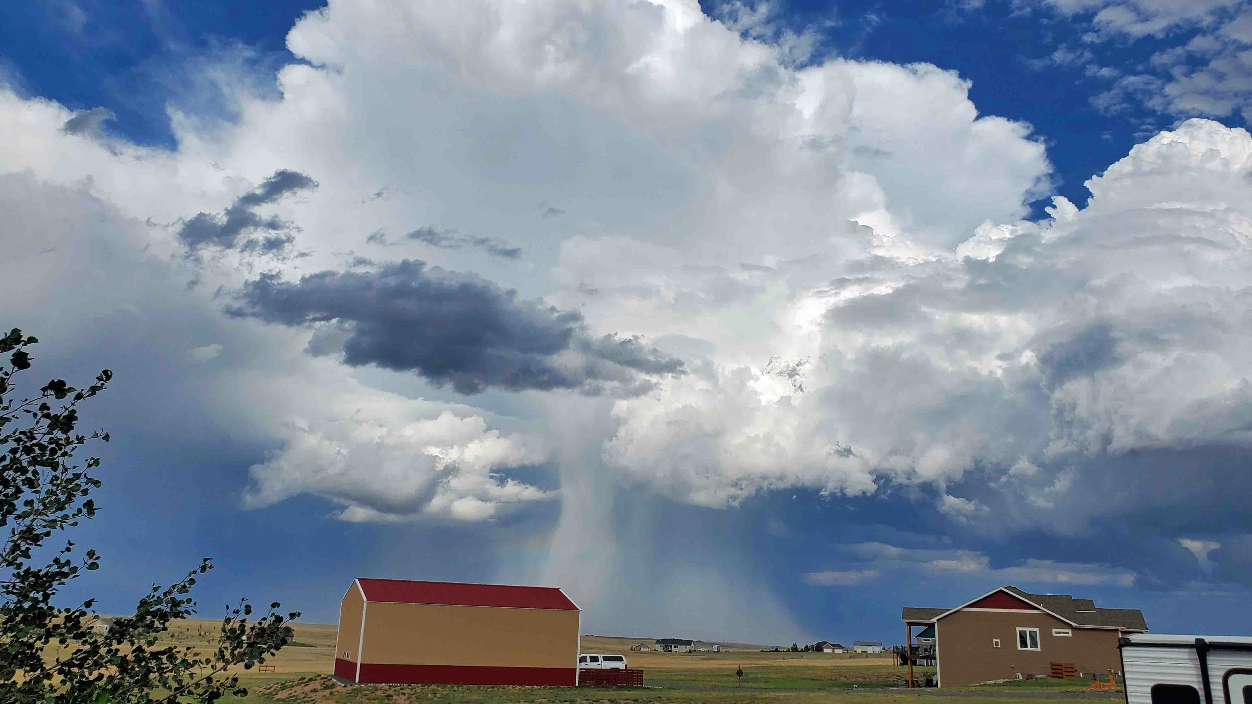 Beautiful thunderstorms north of Cheyenne.  What a downdraft!!