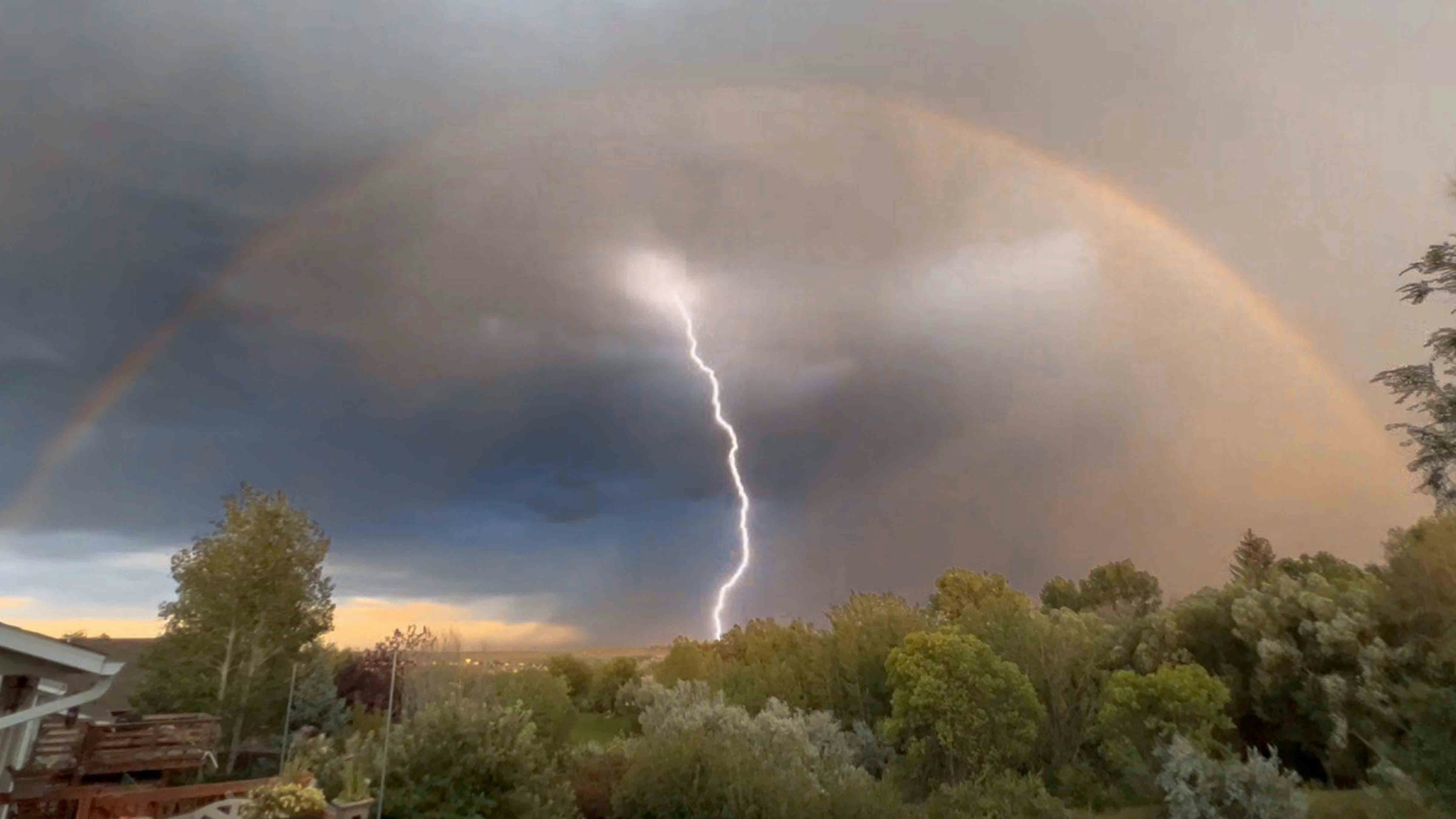Rainbow and lightning storm near Sheridan on Sept 4, 2023
