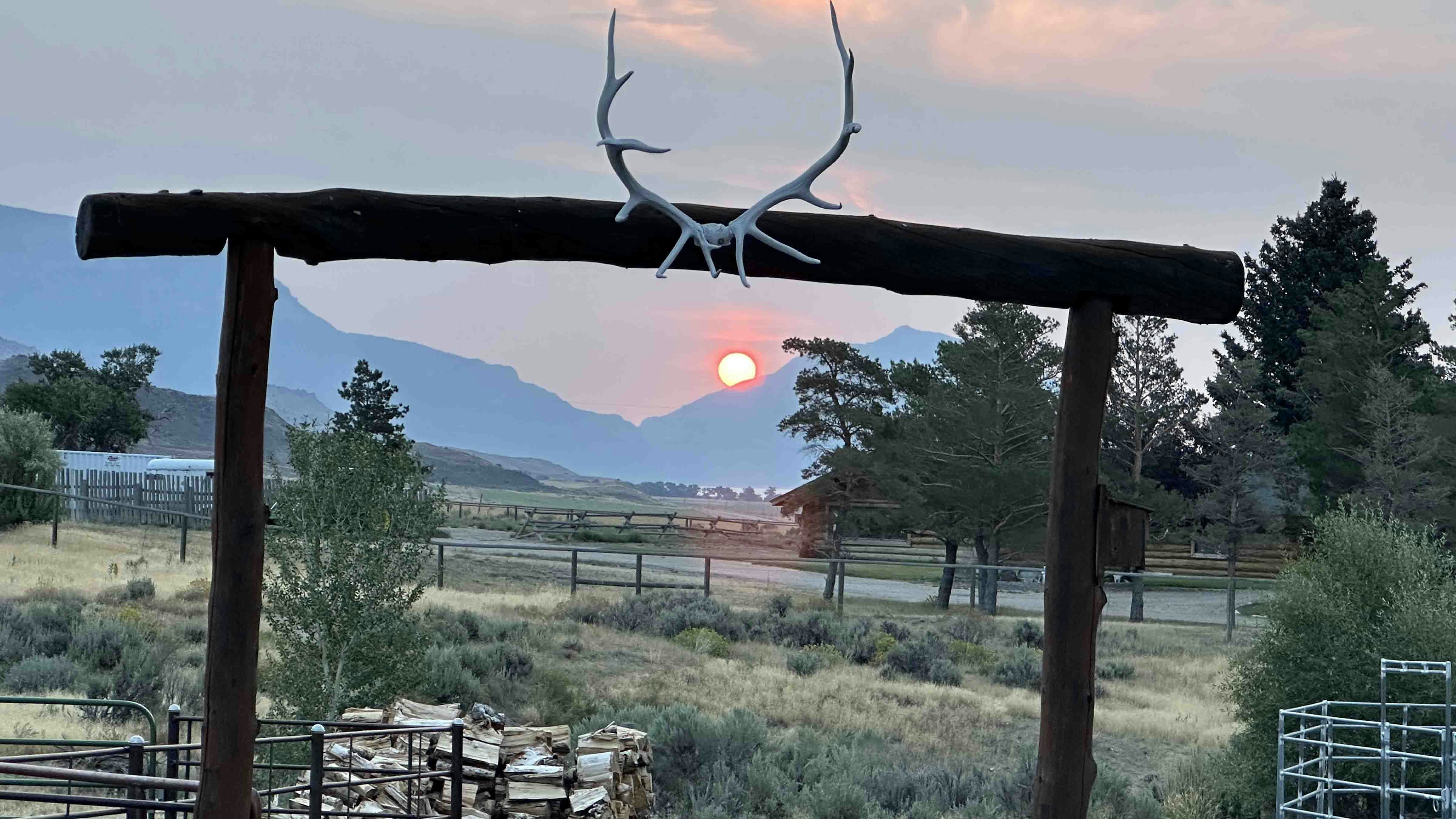 "Smokey sunrise in Wapiti, Wyoming, this morning"