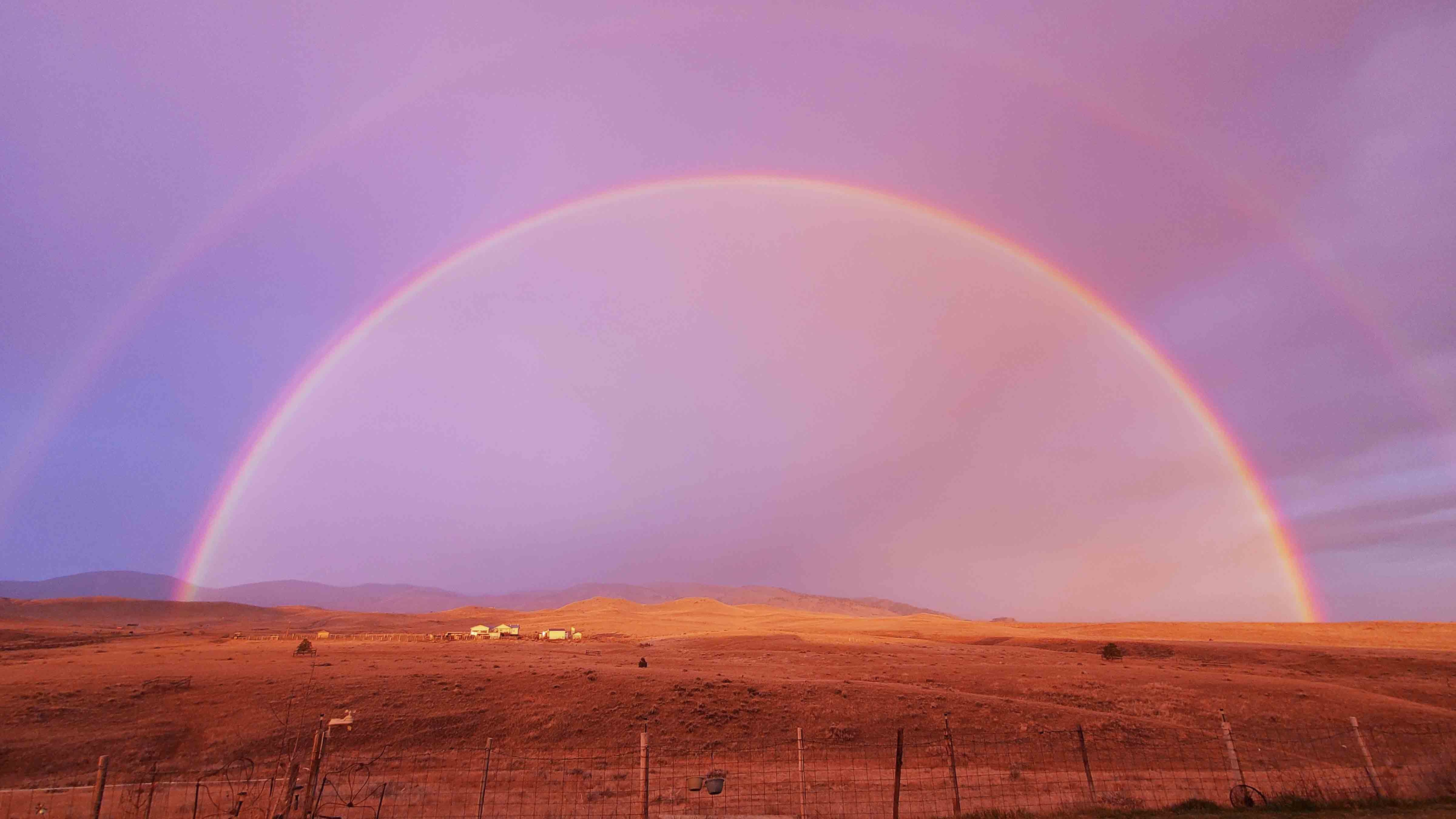 "Sunrise in a rainshower south of Buffalo."