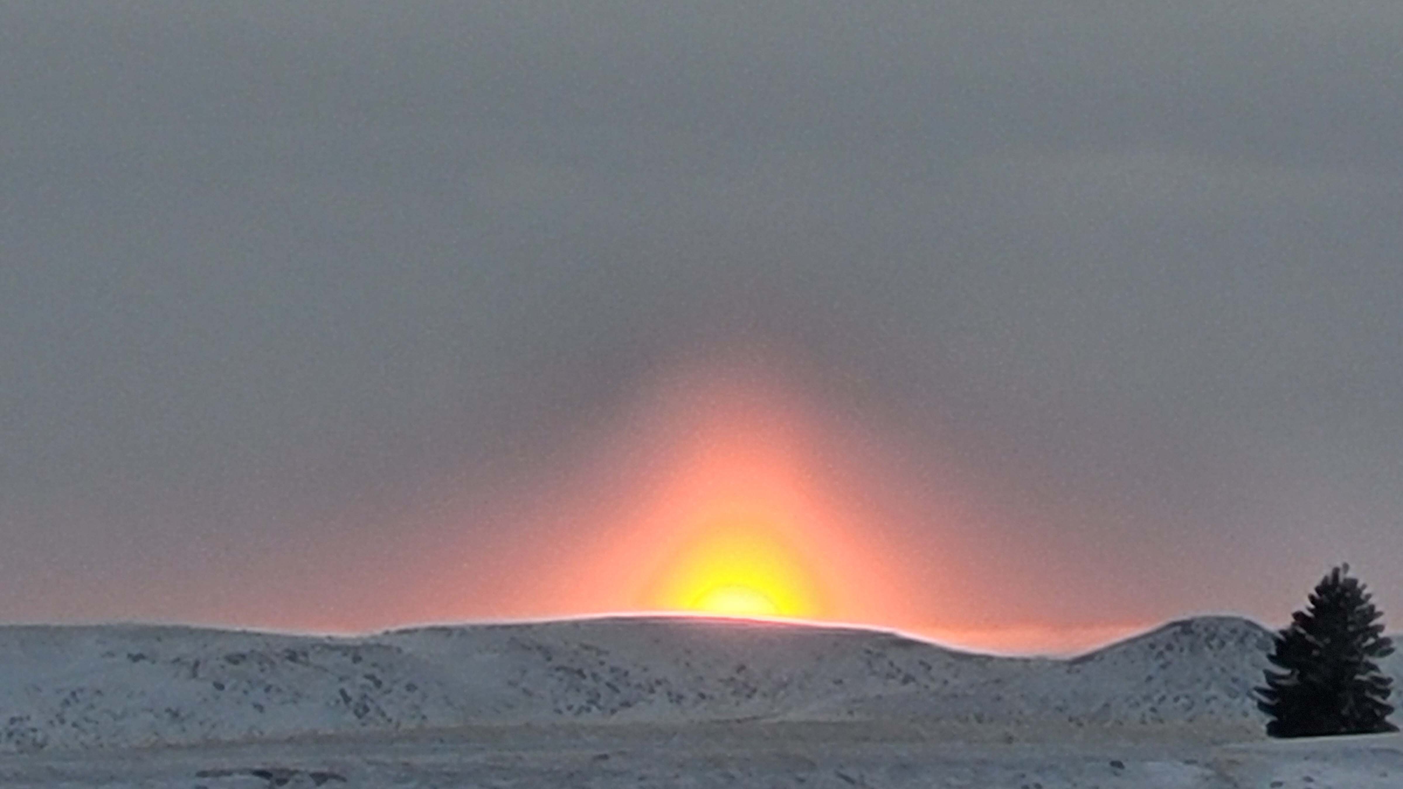 I live in Gillette and am blessed with a clear view of our epic sunsets. This was taken this evening as the day was saying goodbye to us. I love the unique image as if the sun was mimicking the buttes of our high plains. I love Wyoming!"
