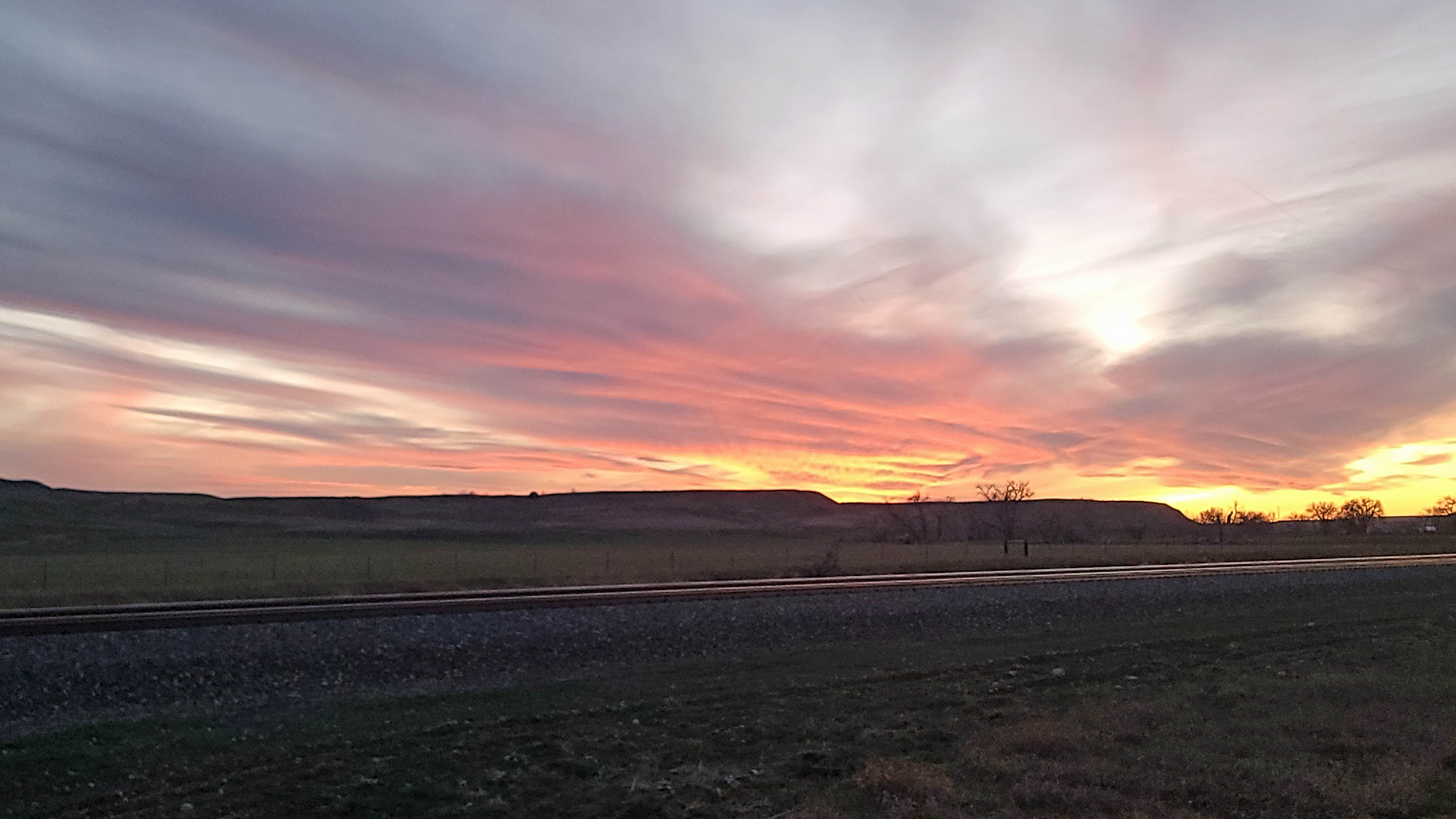 "Sunset just south of the North Platte River bridge on State Hwy. 319 to Glendo."