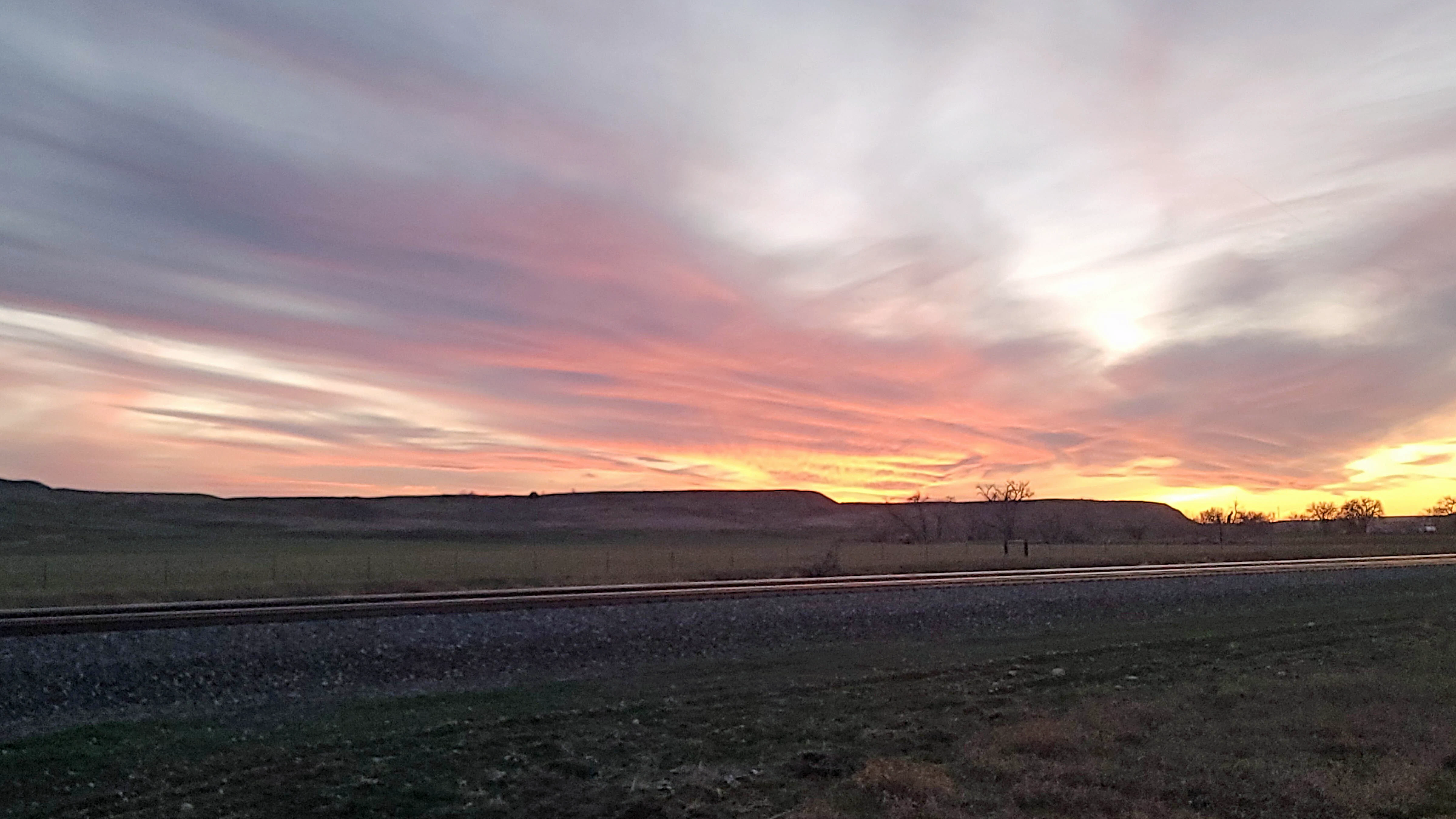 "Sunset just south of the North Platte River bridge on State Hwy. 319 to Glendo."