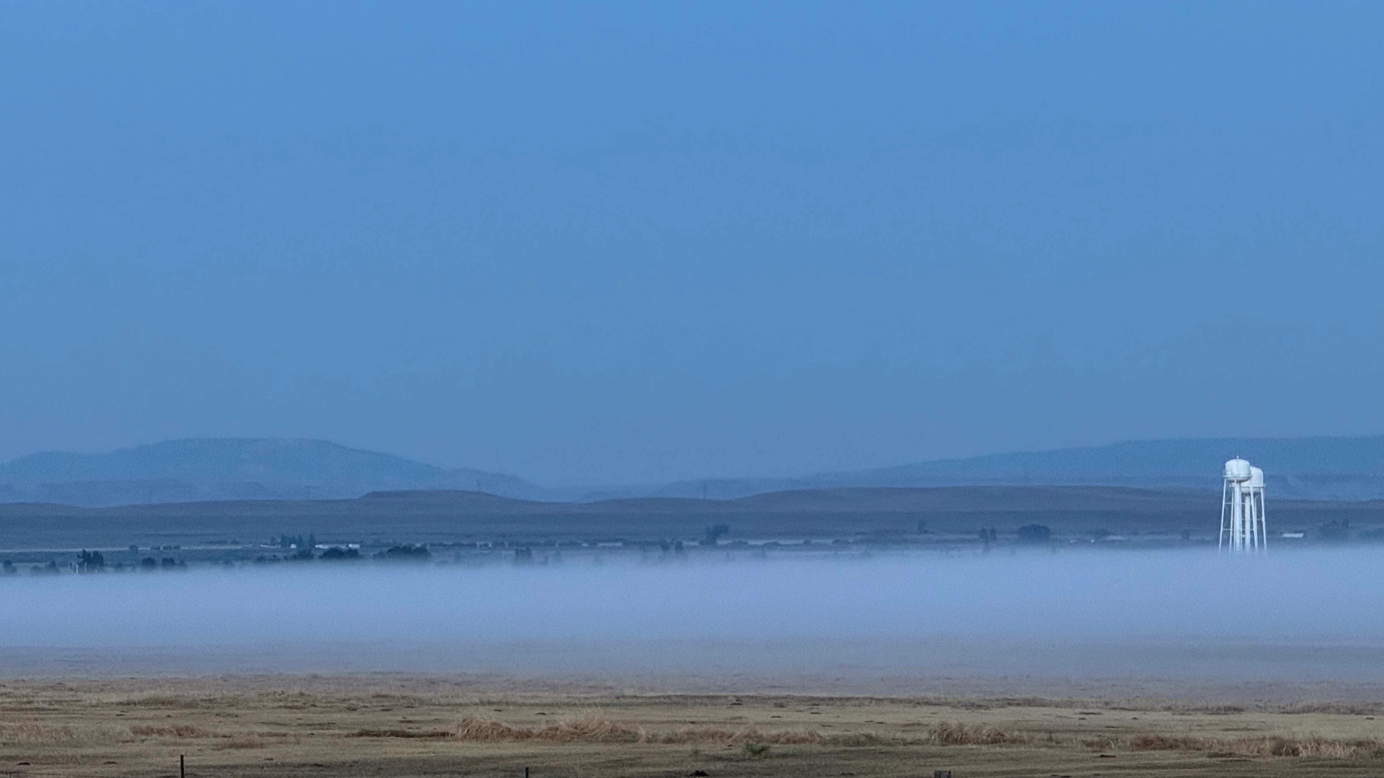 "Fog bank rolling over Big Piney."