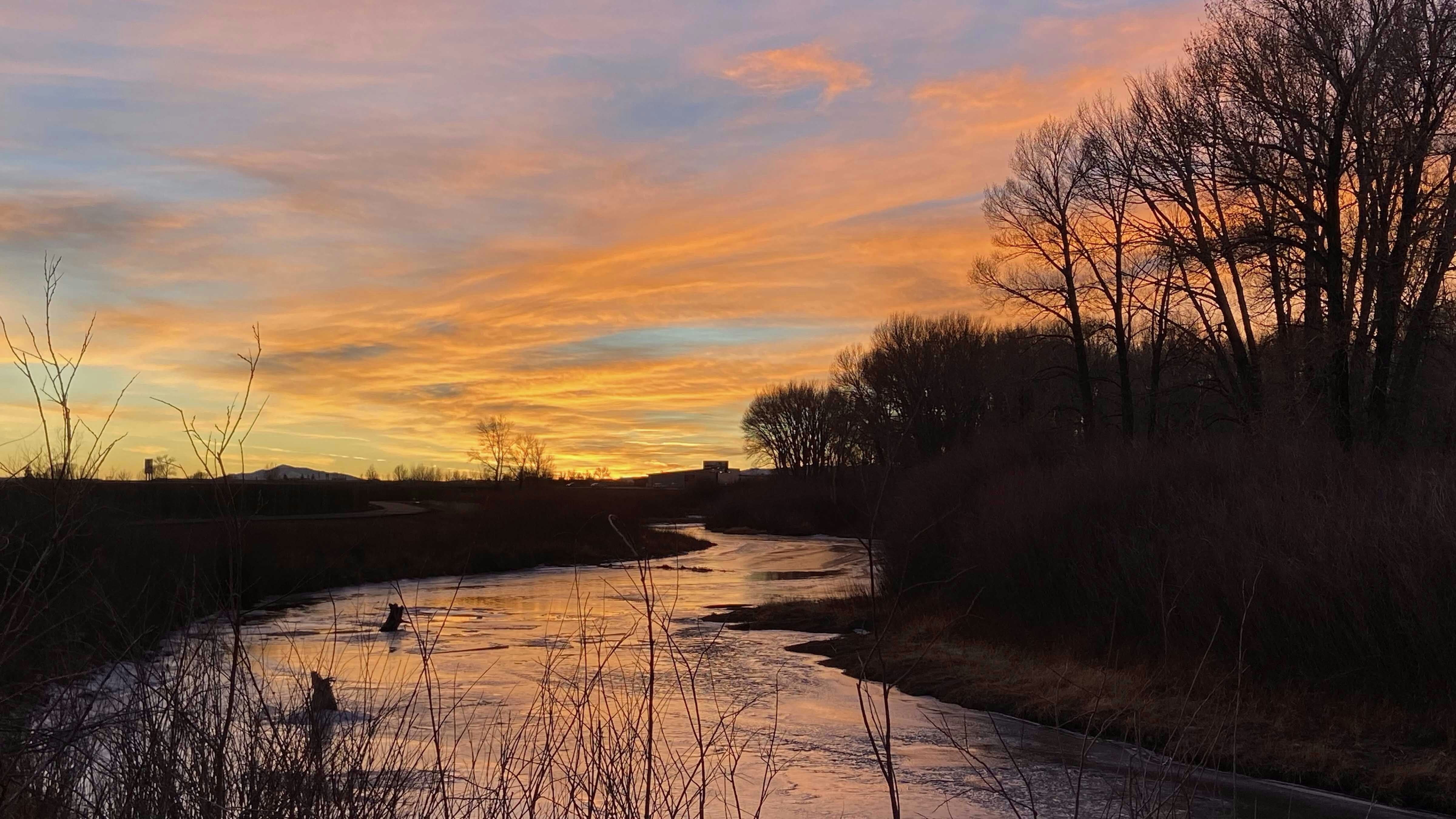 "Beautiful skies on my evening run along the Laramie greenbelt."
