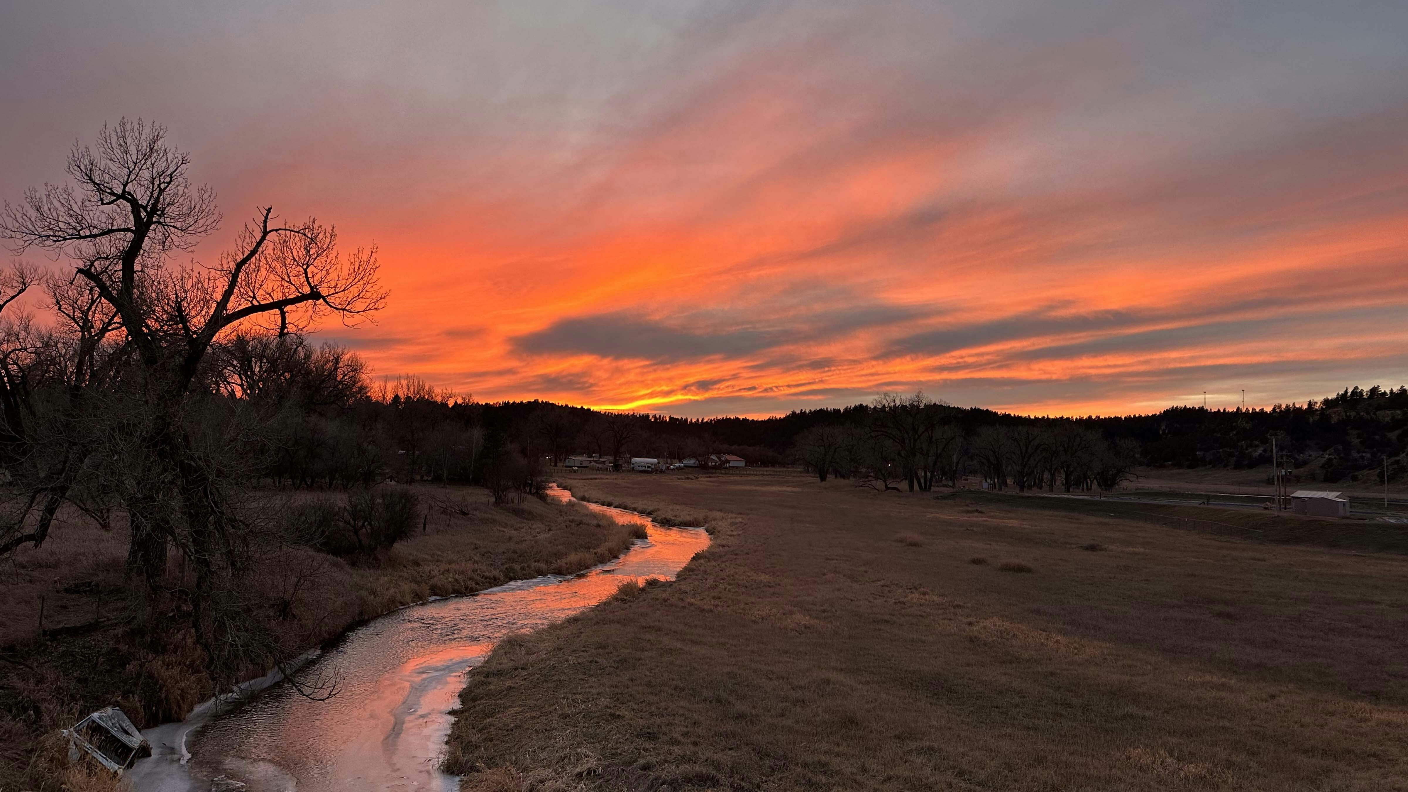 "Love the reflection in the water, sunset over the Belle Fourche river just east of Hulett."