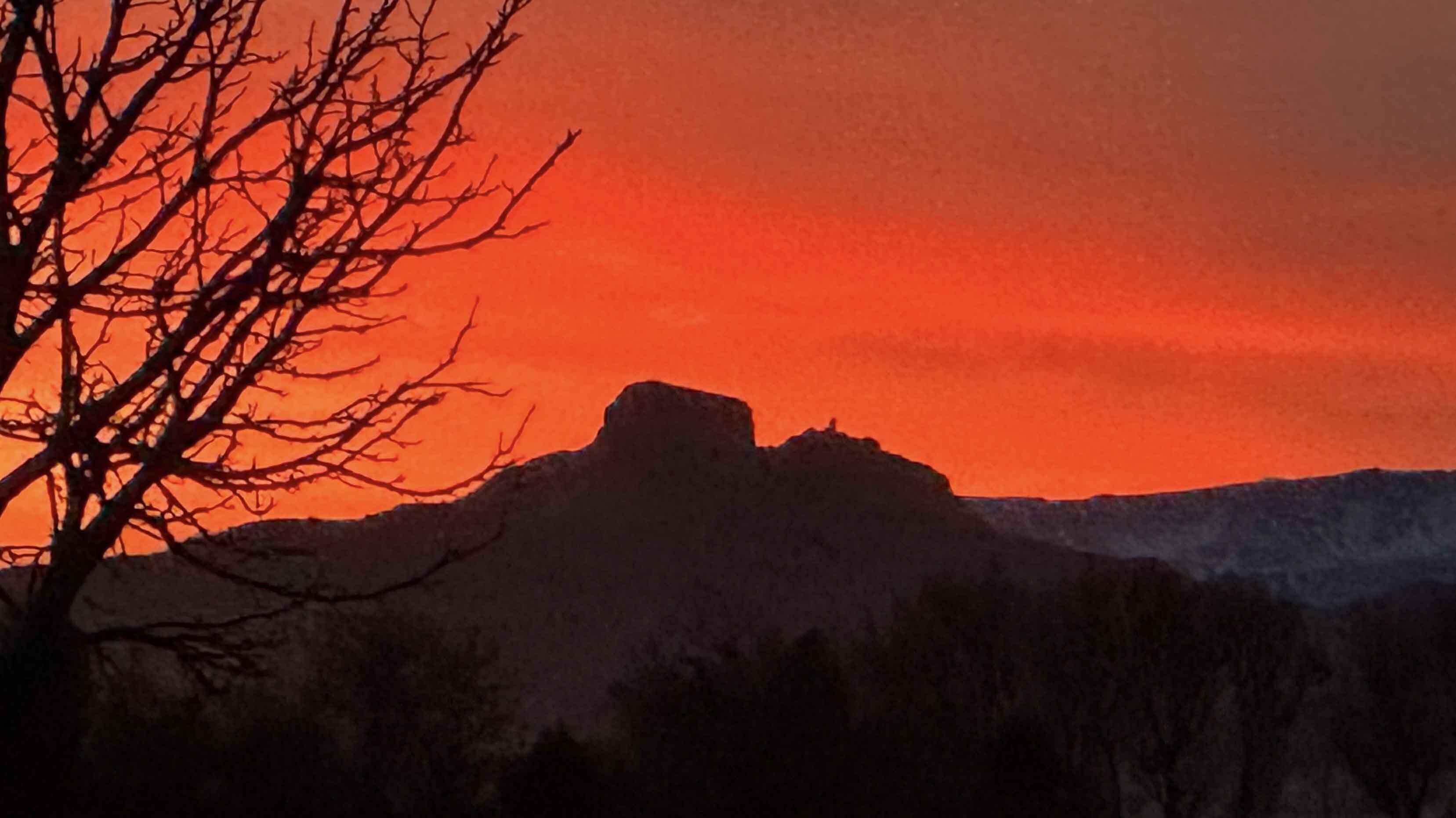 "Fire in the sky surrounding Heart Mountain"