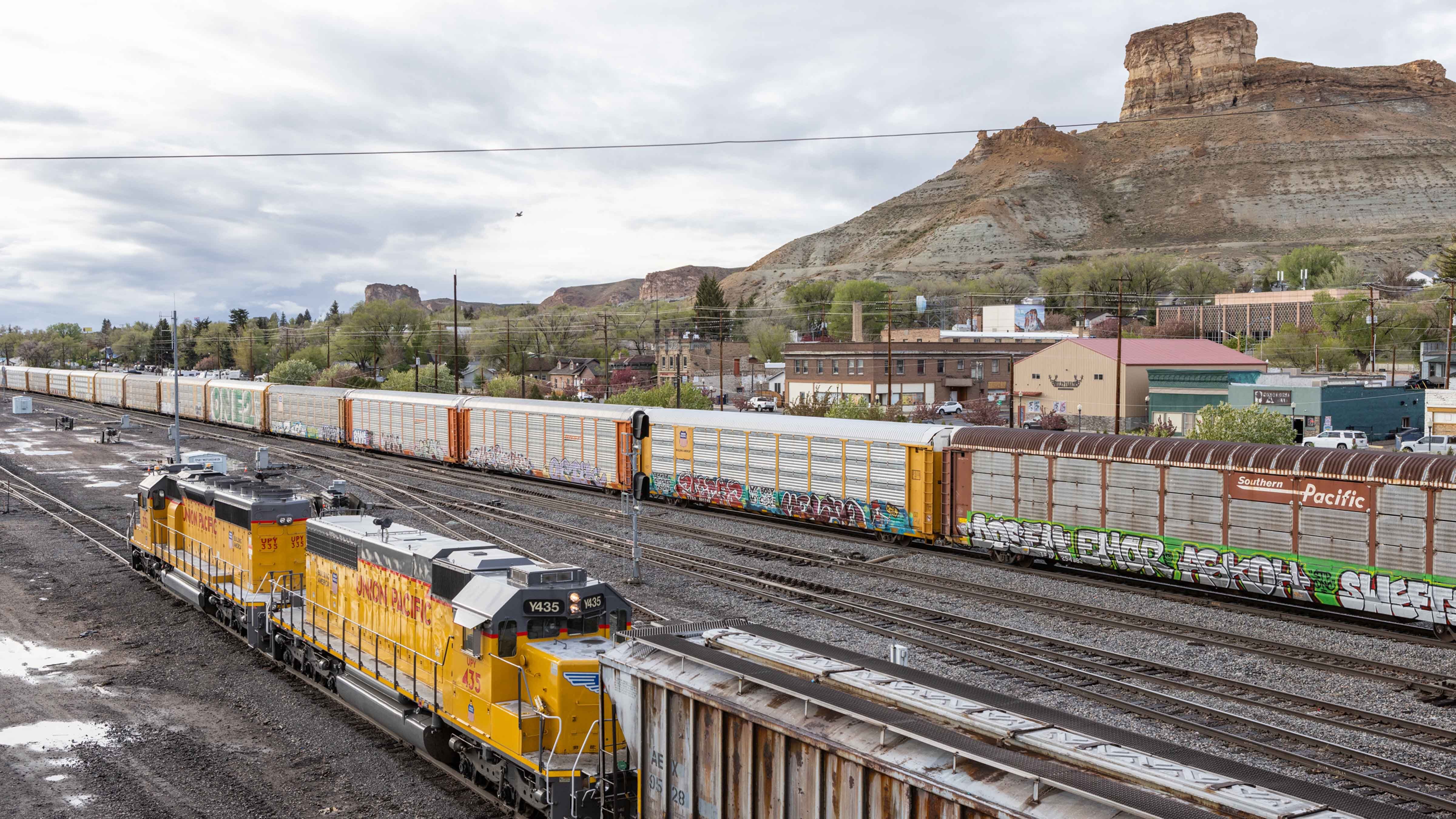 "Castle Rock from the rail yard in Green River, Wyoming. The lead locomotive is Union Pacific 435."