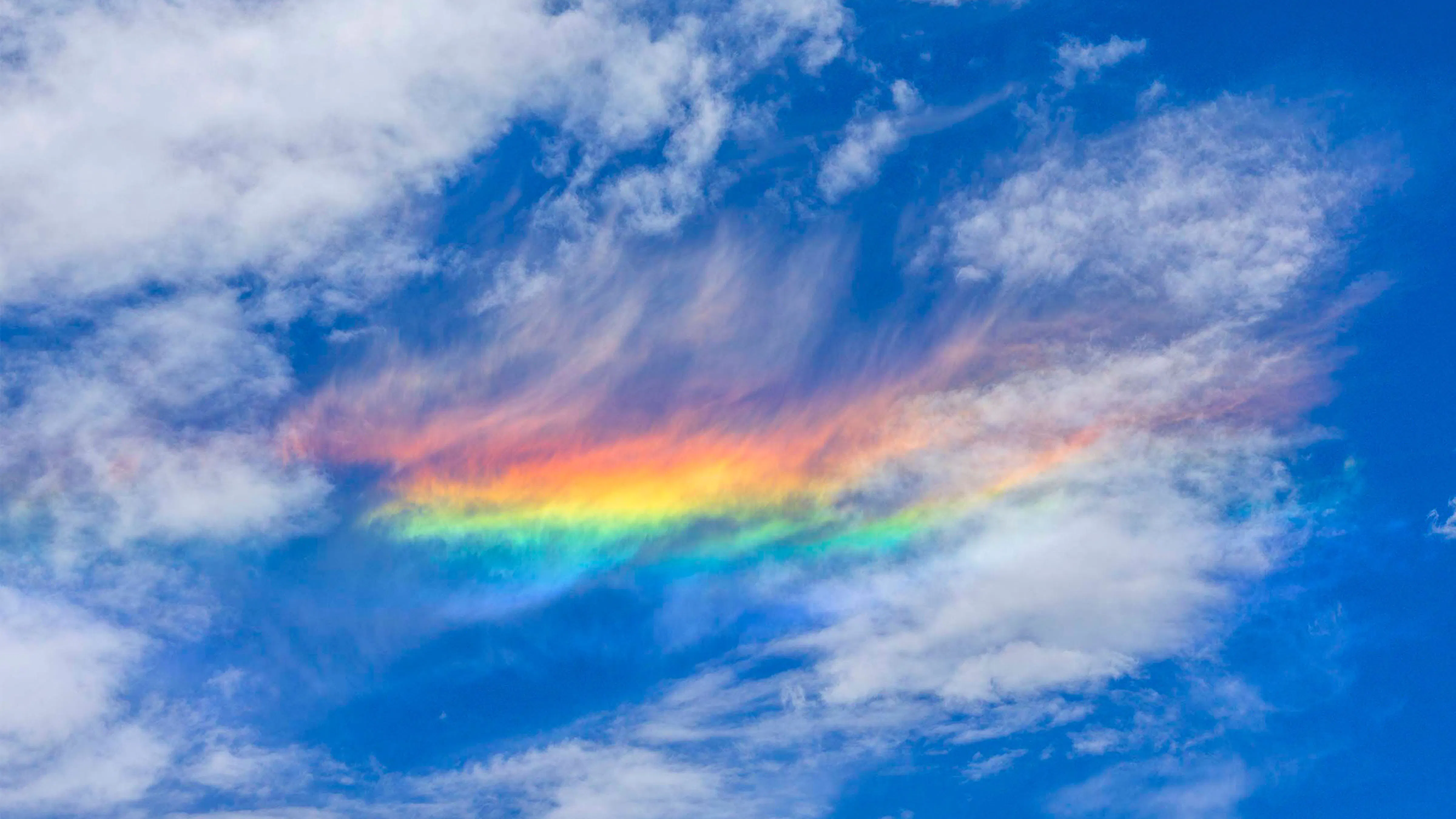 A gorgeous rainbow cloud appeared Friday in the high level altocirrus and cirrocumulus clouds overhead in Pinedale. It was probably the most brilliant rainbow cloud I have ever witnessed.