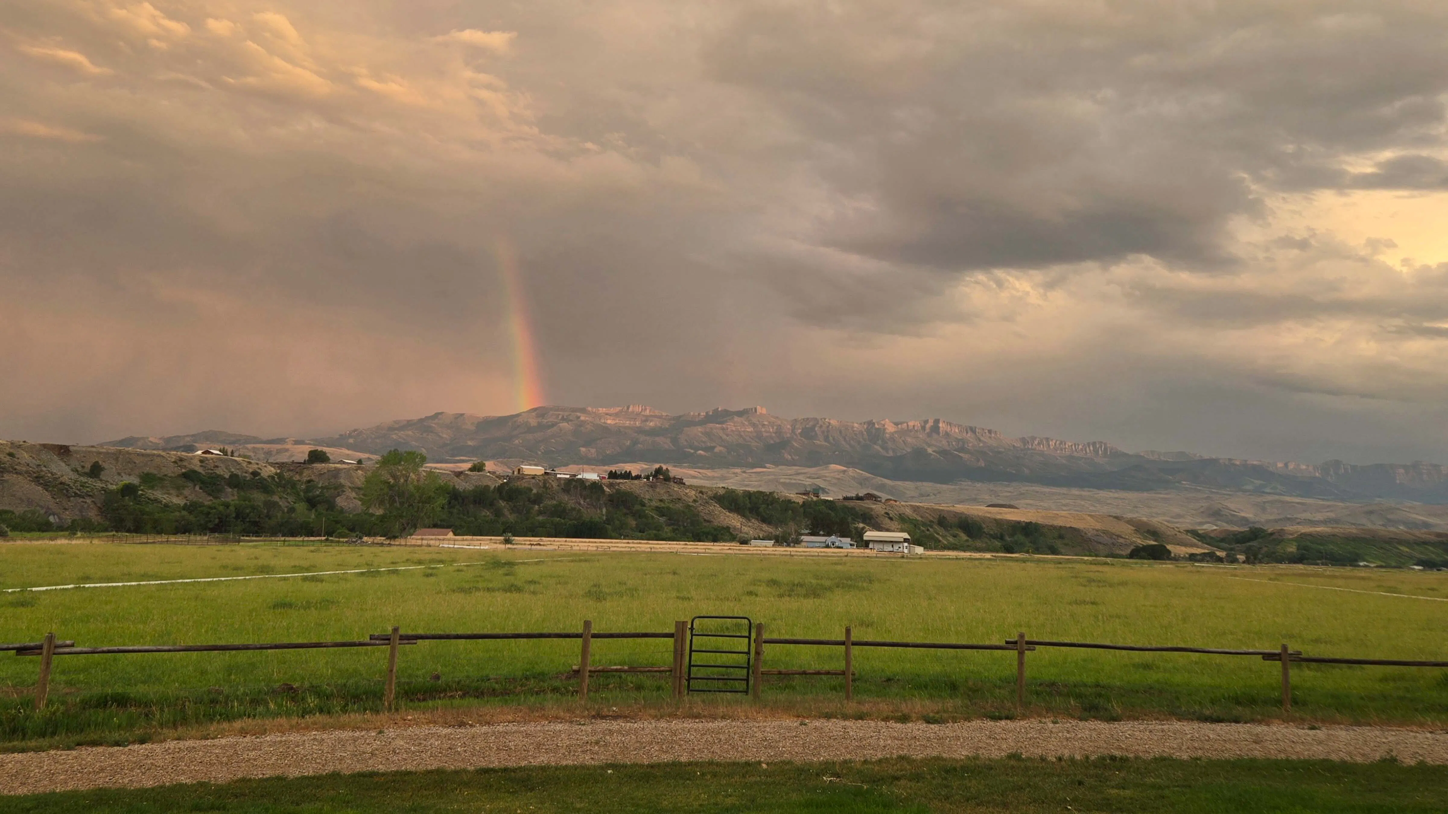 "Thunderstorms finally cooled things down and left a rainbow on Carter Mountain above the South Fork valley, Park County."