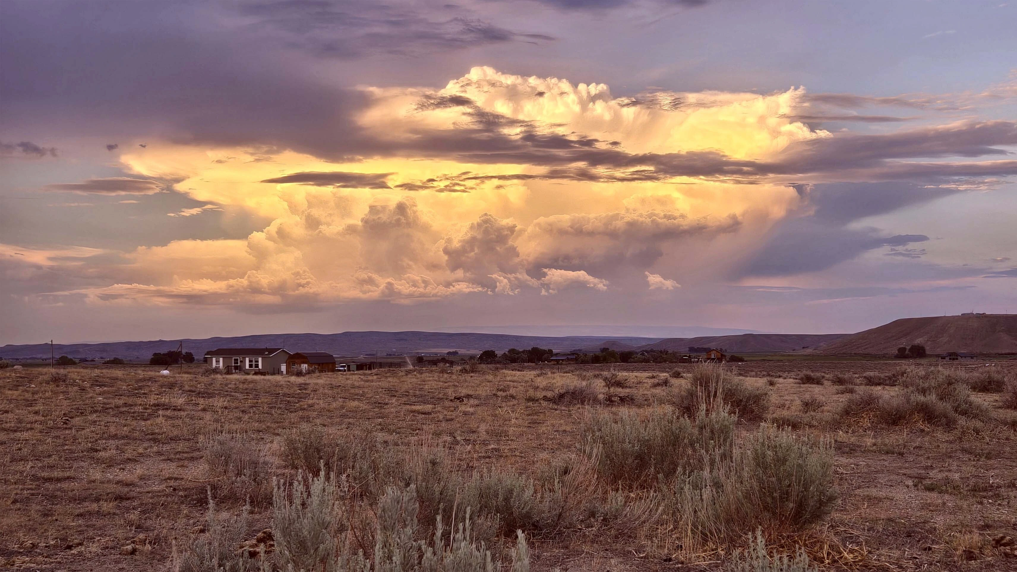 "Evening thunderhead over the Pryor Mountains from Clark, Wyoming"