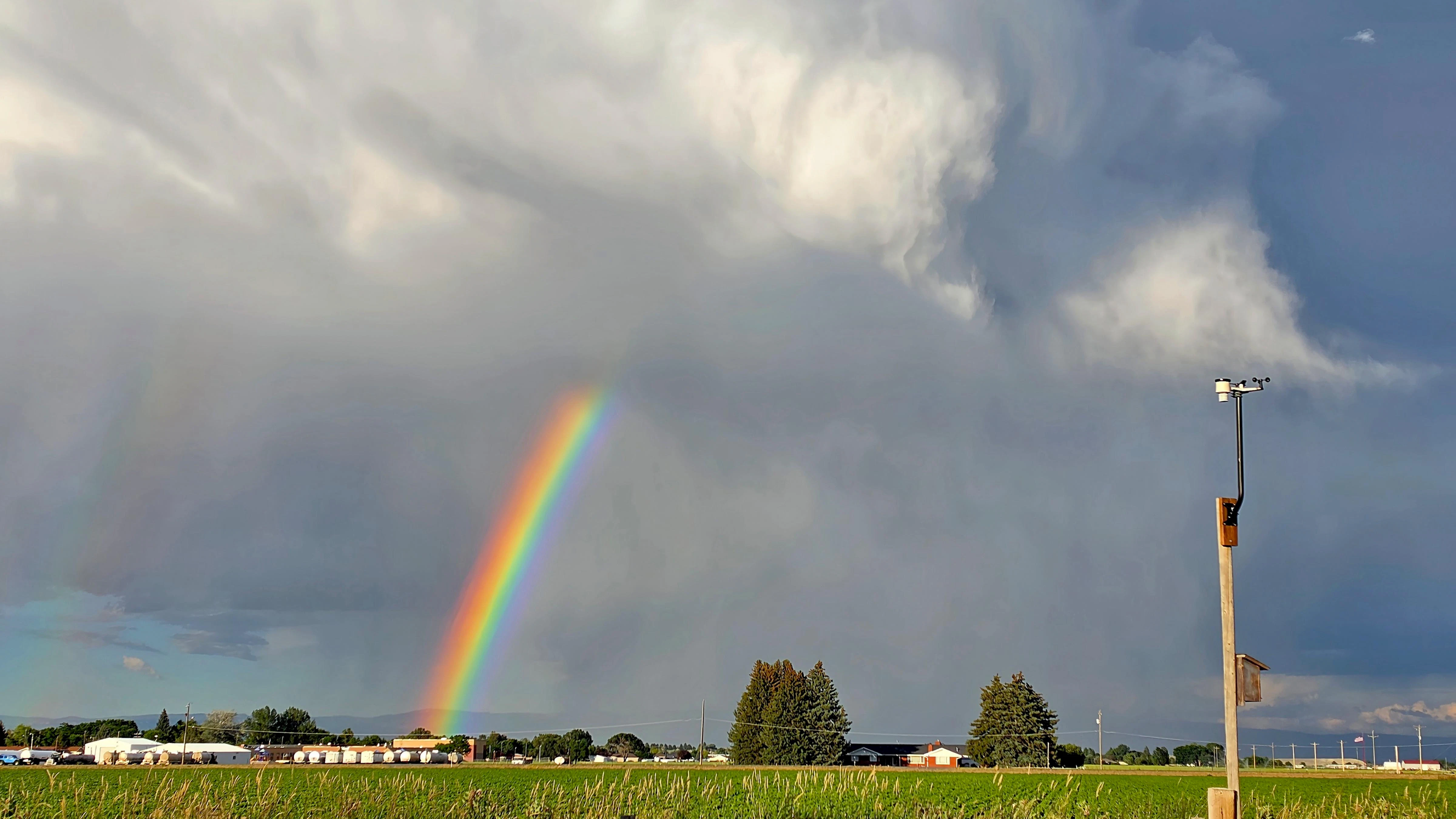 The last day of June gave us a colorful display with a rainbow over Southside Elementary School in Powell, Wyoming.