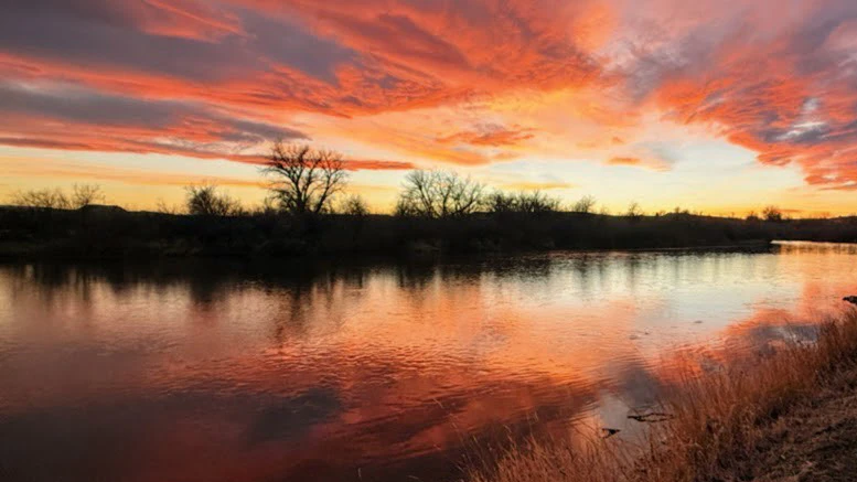 "Sunset at Fish Hook. Four miles north of Thermopolis. 84 above today!"