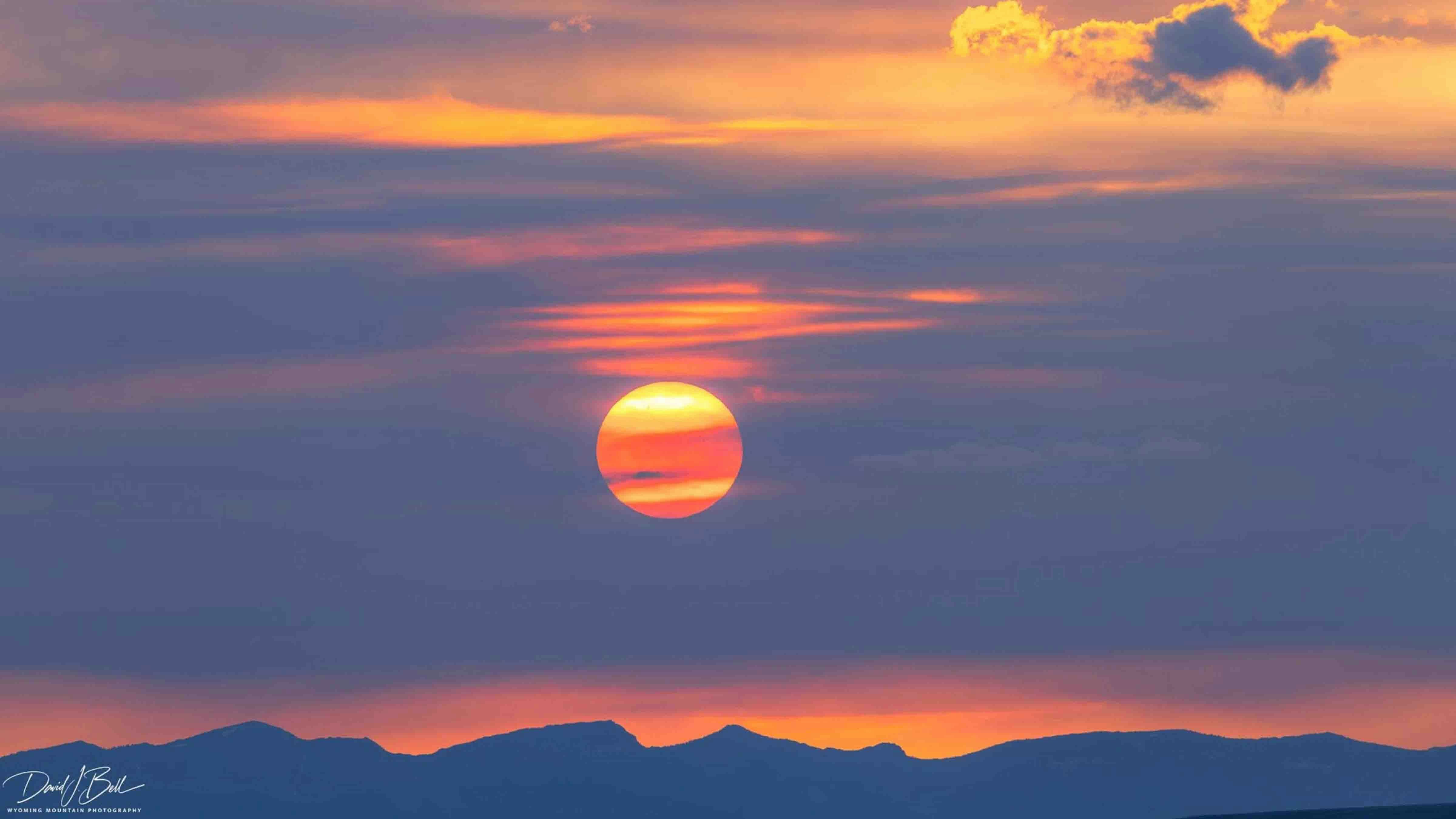 "A rather random cloud of wildfire smoke moved through the valley last night, at sunset.  The setting sun got pretty intense as it set behind this smoke filter."