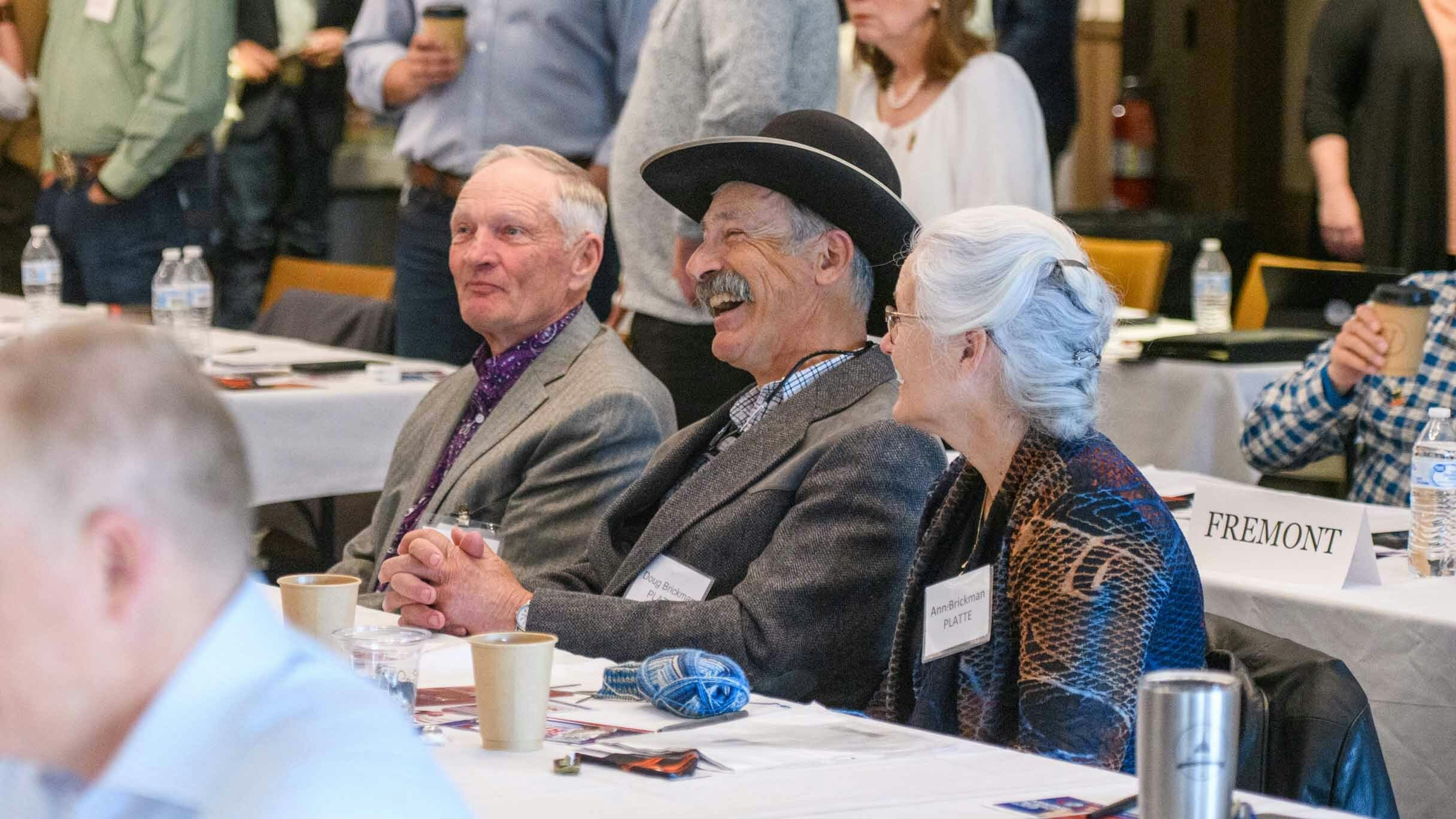Delegates enjoy a laugh at the GOP state meeting in Jackson, Wyoming.