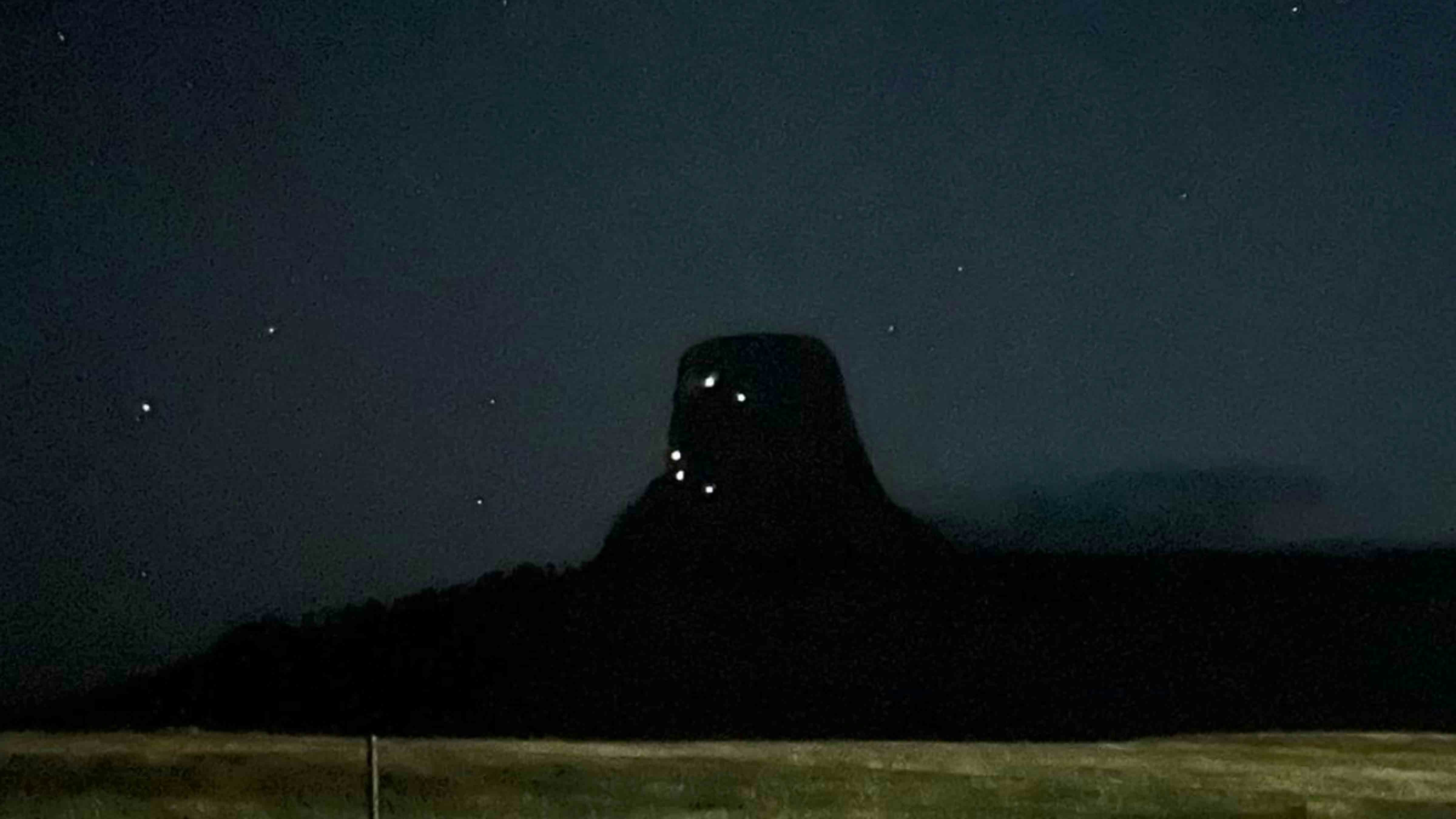 Courtesy: Climbers light up Devils Tower on Thursday, July 4, 2024.