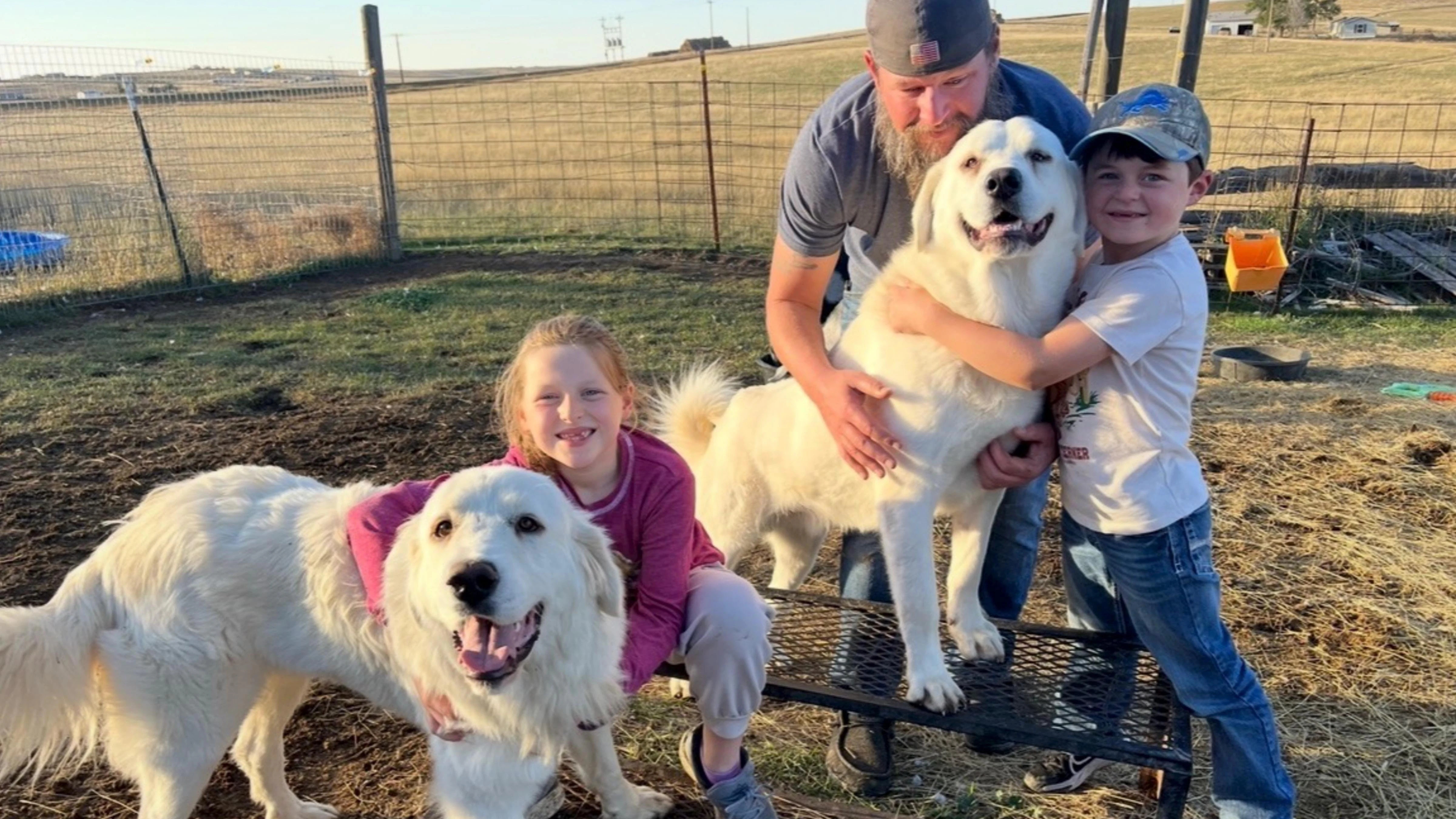 Tango, right, with his brother and members of the Green family at their Gillette home.