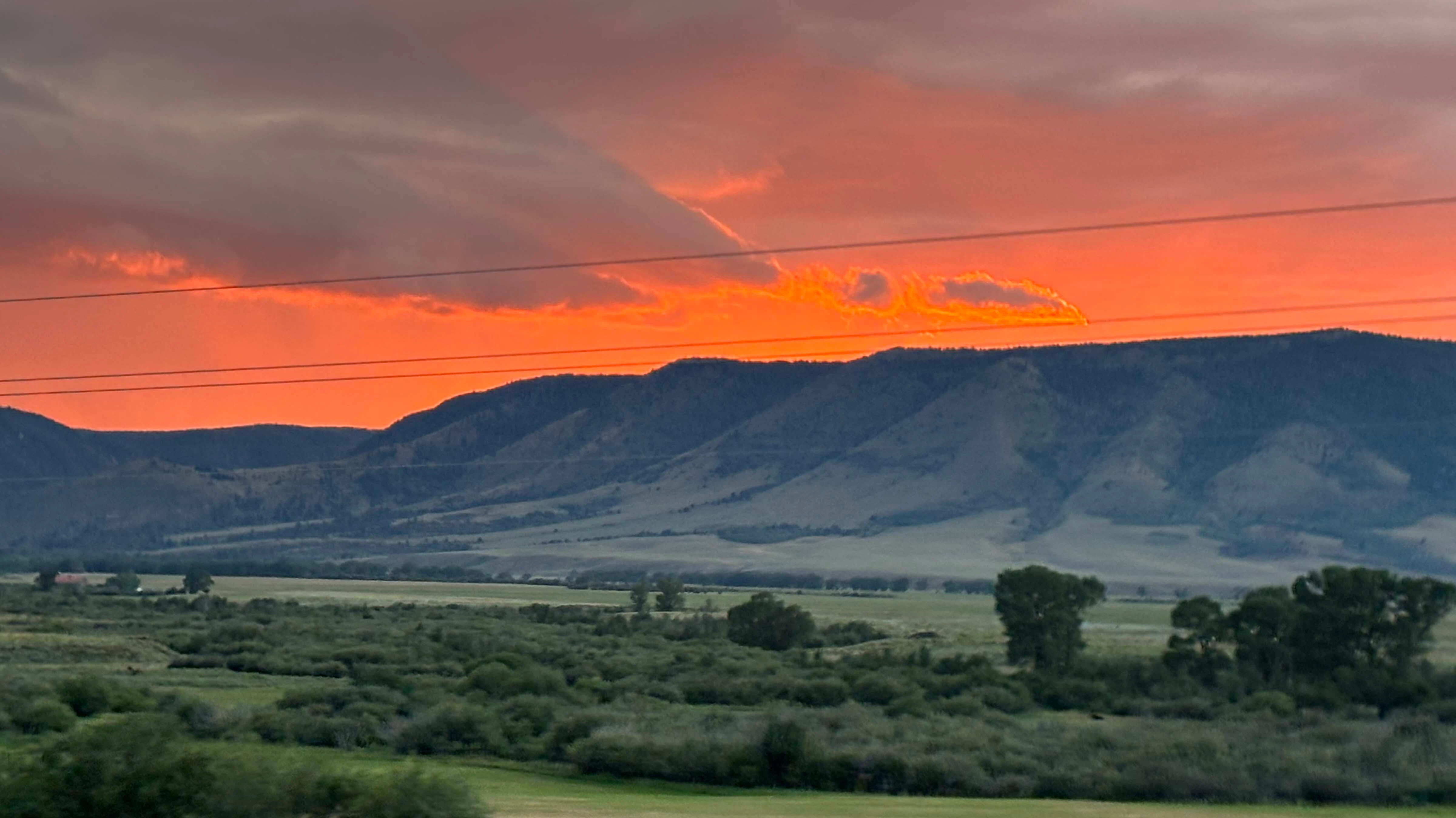 Centennial Ridge glowing after rainstorms moved through—appreciate the rain and the view!