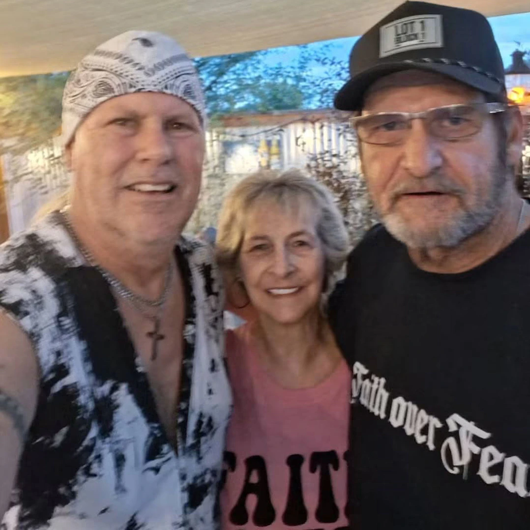 Duane Brown, right, poses with a friend and longtime family friend Mark Carberry, left, at Carberry’s cancer-remission party at the Mexican Inn in Loveland on Aug. 22, less than two months before Brown was killed in a motorcycle crash.