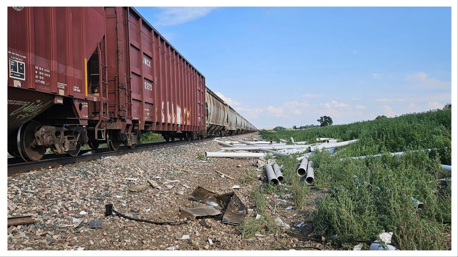 The aftermath of a train wreck in which a semitruck containing two Wyoming men tried to clear a crossing ahead of a freight truck in Nebraska.