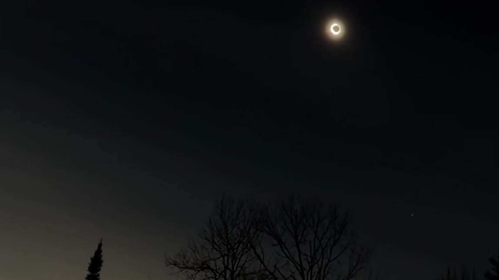 Cowboy State Daily reporter Leo Wolfson was in Moretown, Vermont, on Monday during the total eclipse, taking this photo of totality, which turned the area briefly into night.