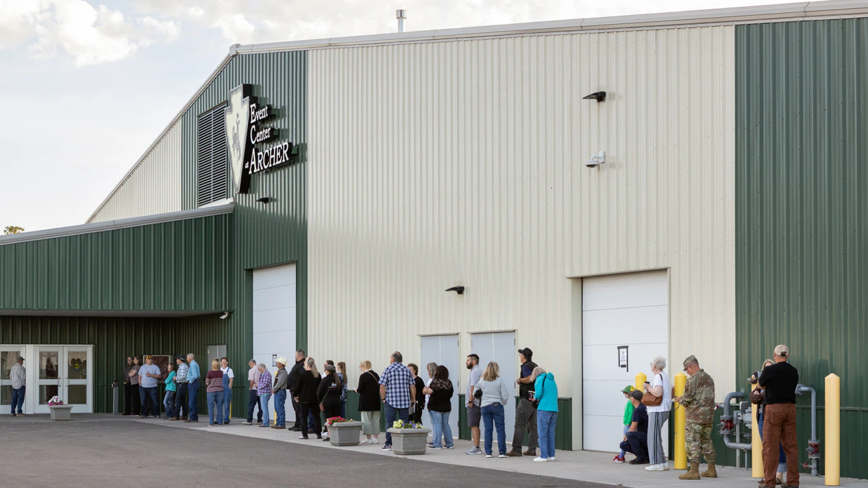 Voters wait for the Archer Event Center east of Cheyenne to open to vote in the Primary Election on August 18, 2026.