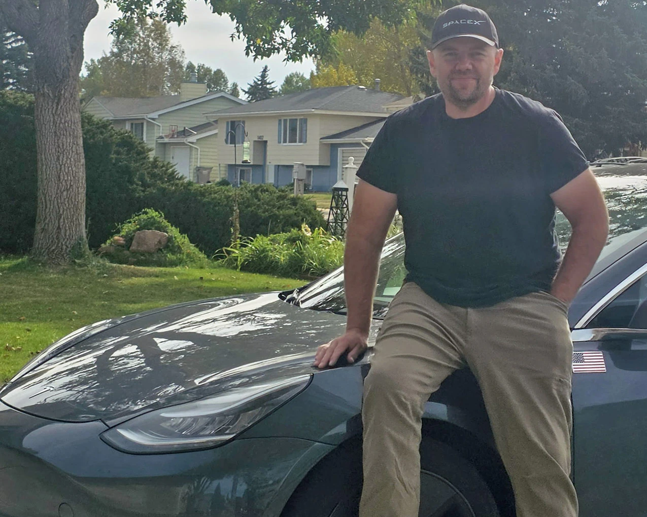 Eric Secrist of Laramie with his Tesla. He bought his first in 2024 and now drives Uber full time.