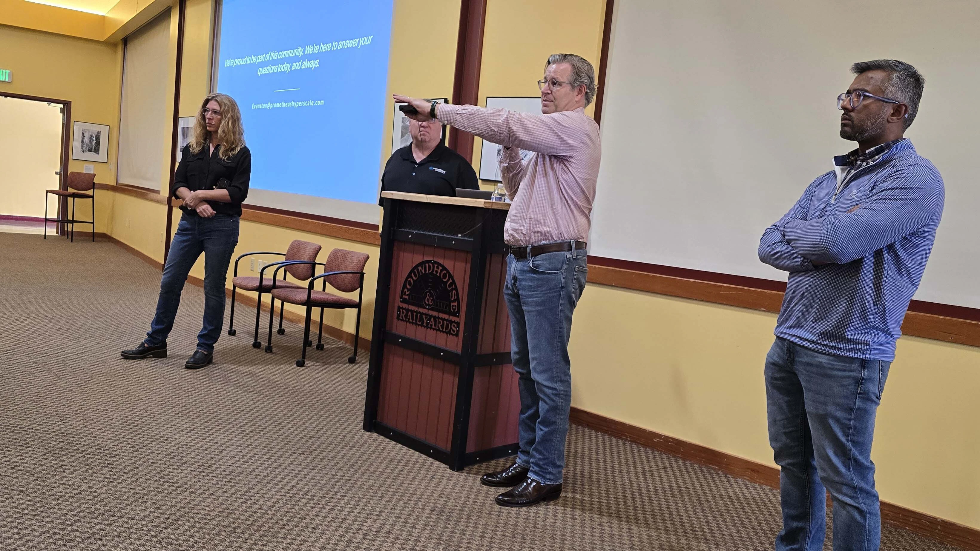 Trenton Thornock answers questions from a packed house in Evanston, where Prometheus Hyperscale held a meeting to answer the public's questions about a data center he's proposed on his family's ranch land