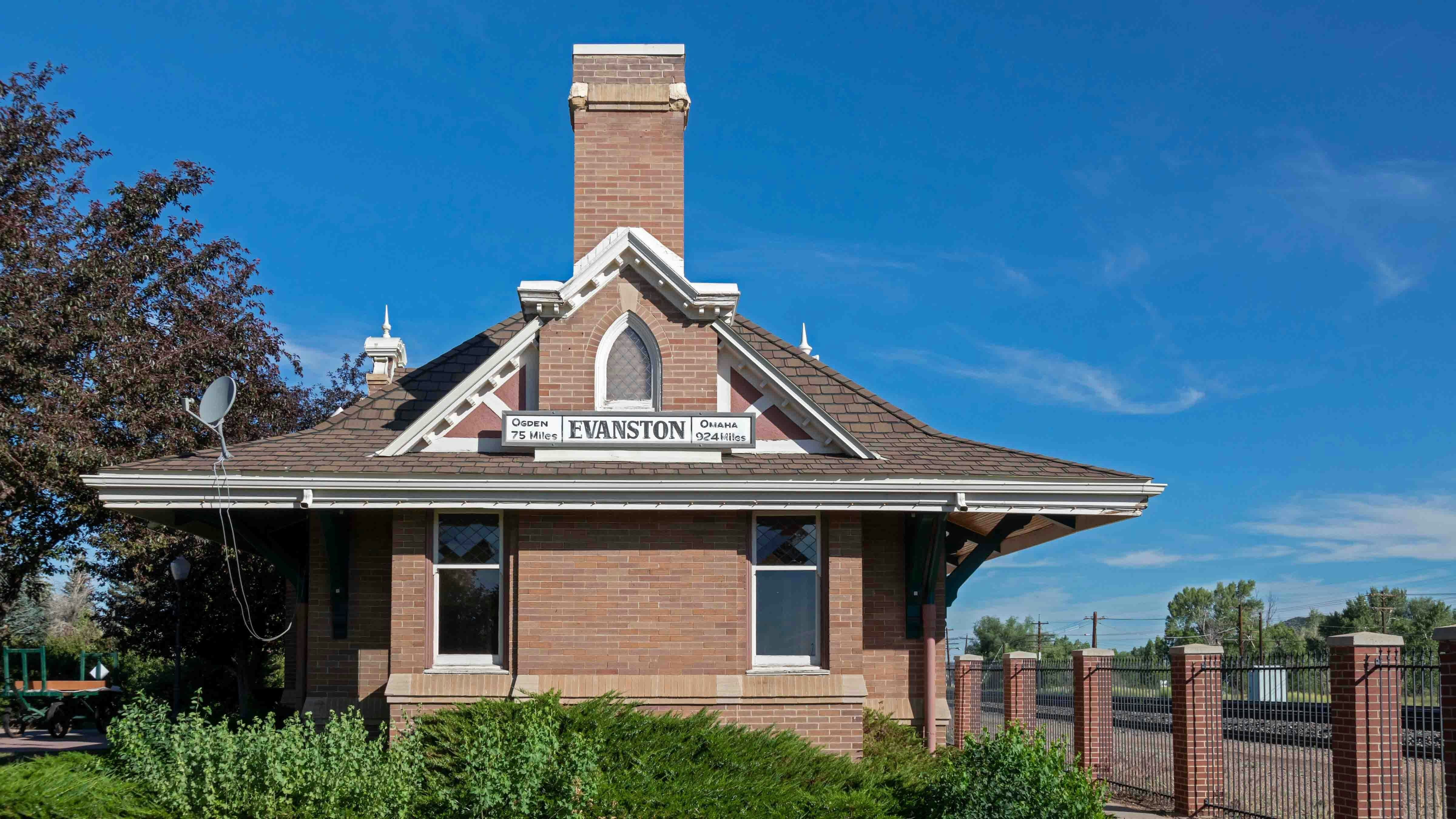 The Union Pacific passenger depot, built in 1900 with separate waiting rooms for men and women. Evanston no longer has passenger rail service; the building is now used for community events.