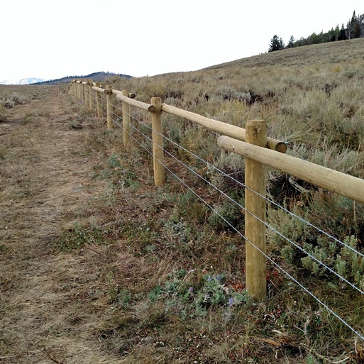 This section of “wildlife-friendly” fence in the Pinedale region was designed by the Wyoming Game and Fish Department to make it easier for wildlife to get over or under it.