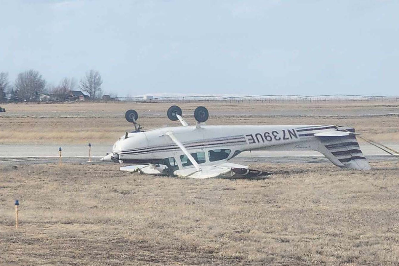 Nobody was hurt when this single-engine Cessna 172N was caught by a wind gust and flipped at the Casper/Natrona County International Airport.