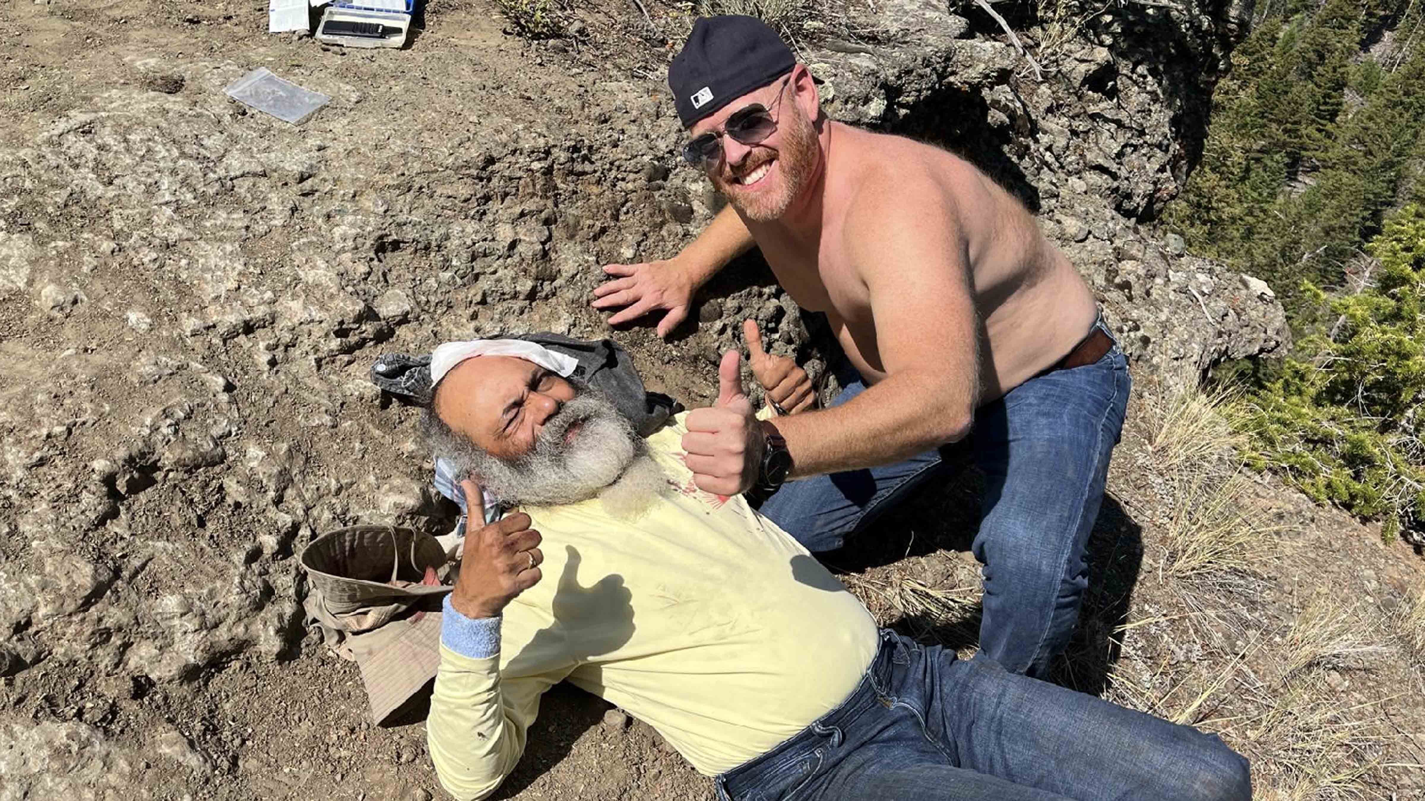 Josh Baker, right, comforts his friend, Bhuvan Unhelkar of Sarasota, Fla, who was seriously injured in September while horseback riding in Cody